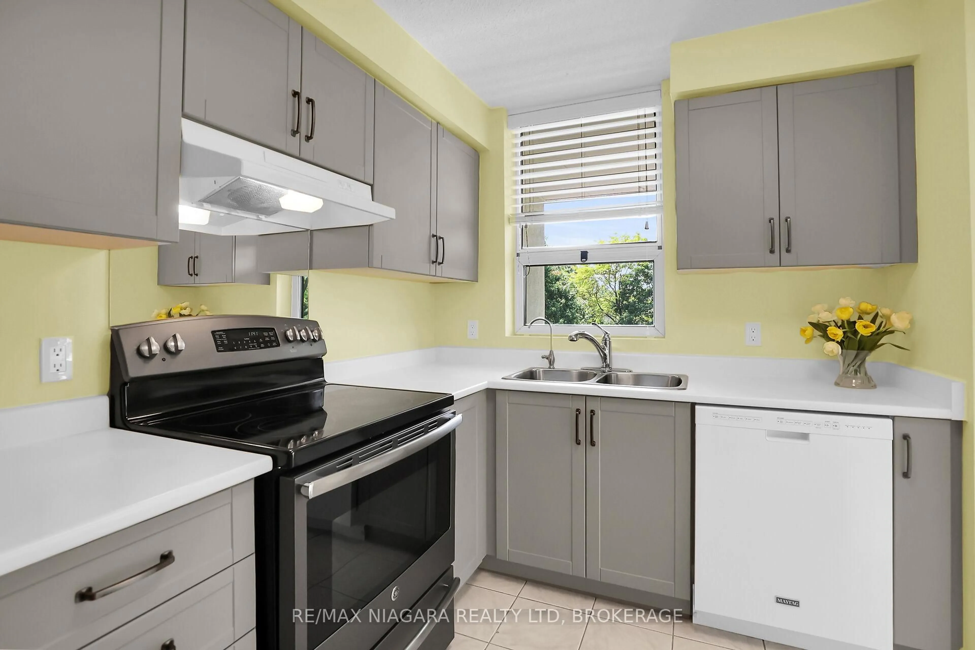 Standard kitchen, ceramic/tile floor for 81 Scott St #304, St. Catharines Ontario L2N 7L5