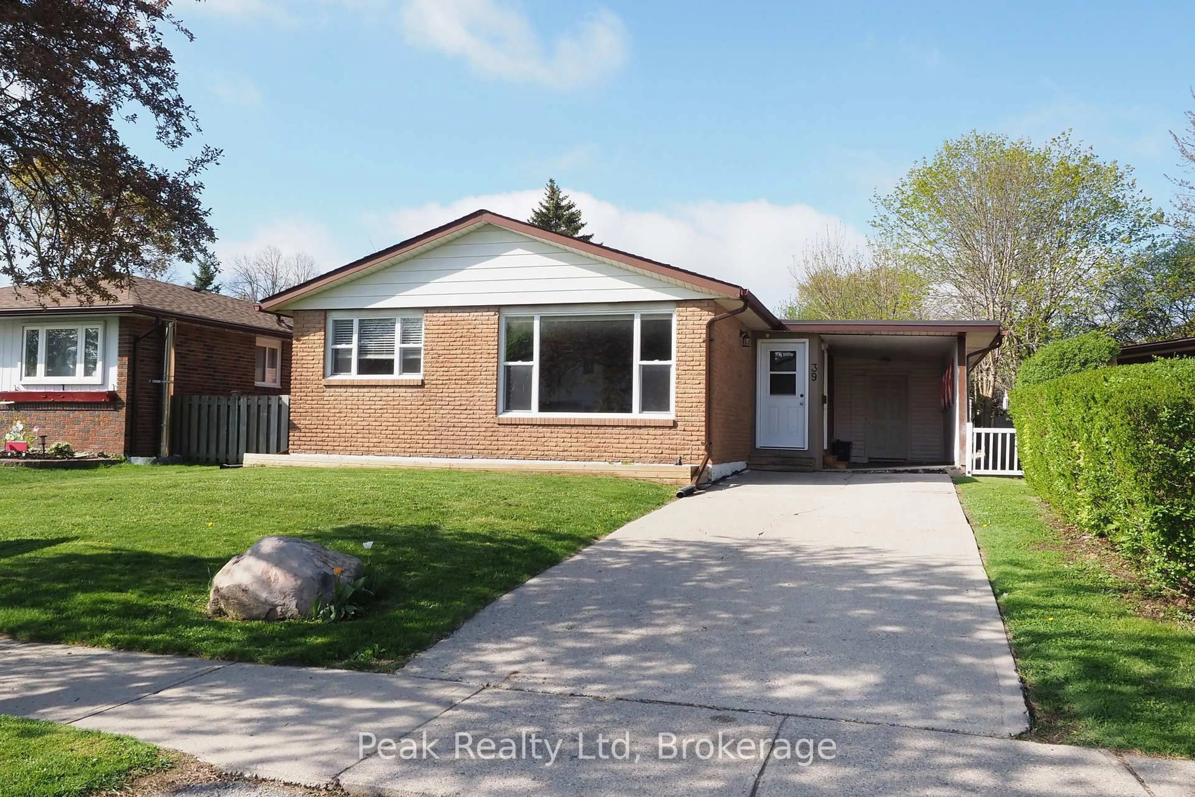 Home with brick exterior material, street for 39 Markwood Dr, Kitchener Ontario N2M 2H3