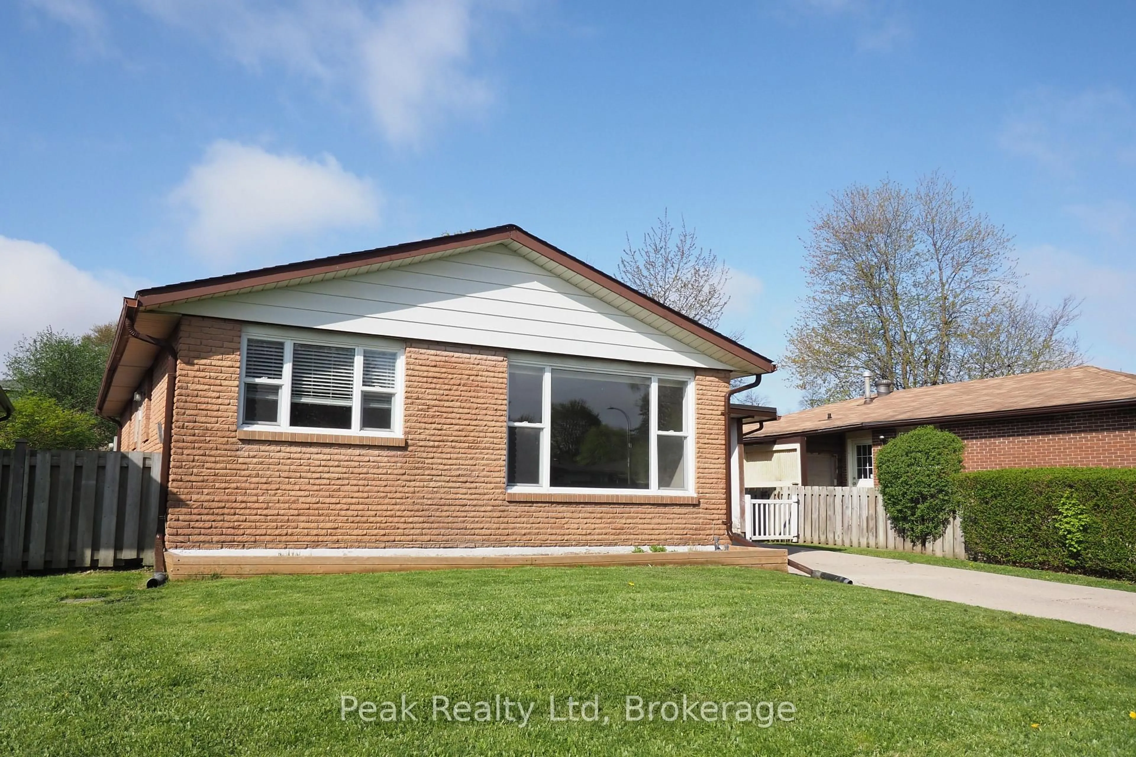 Home with brick exterior material, street for 39 Markwood Dr, Kitchener Ontario N2M 2H3