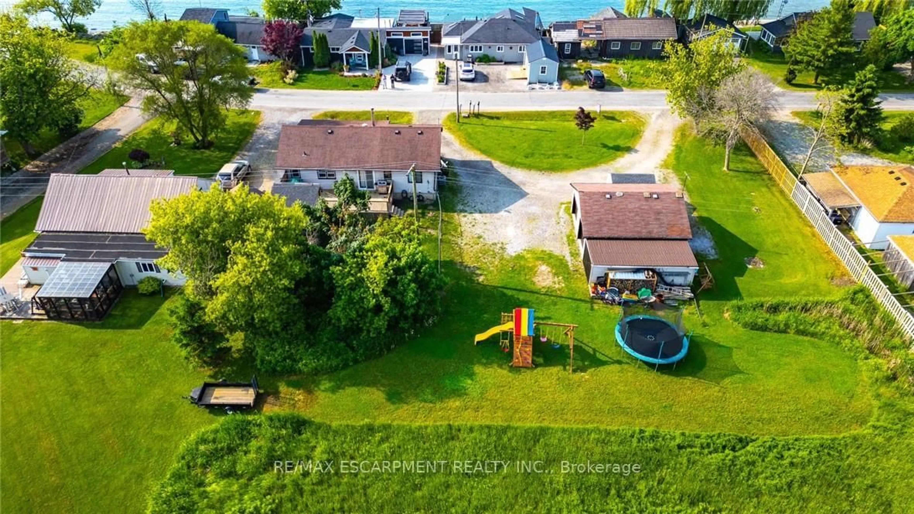 A pic from outside/outdoor area/front of a property/back of a property/a pic from drone, unknown for 1199 Lakeshore Rd, Haldimand Ontario N0A 1P0
