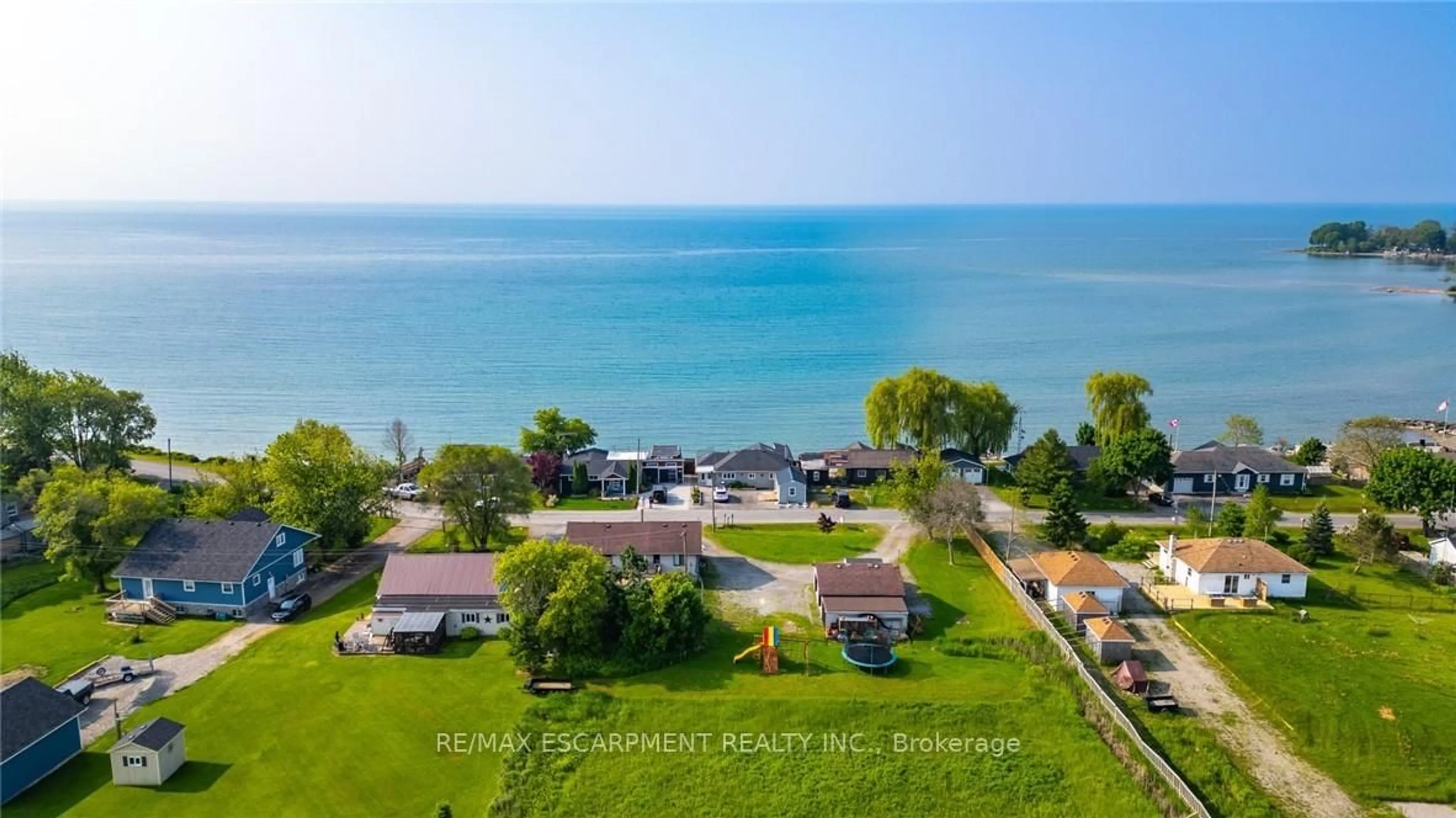 A pic from outside/outdoor area/front of a property/back of a property/a pic from drone, water/lake/river/ocean view for 1199 Lakeshore Rd, Haldimand Ontario N0A 1P0