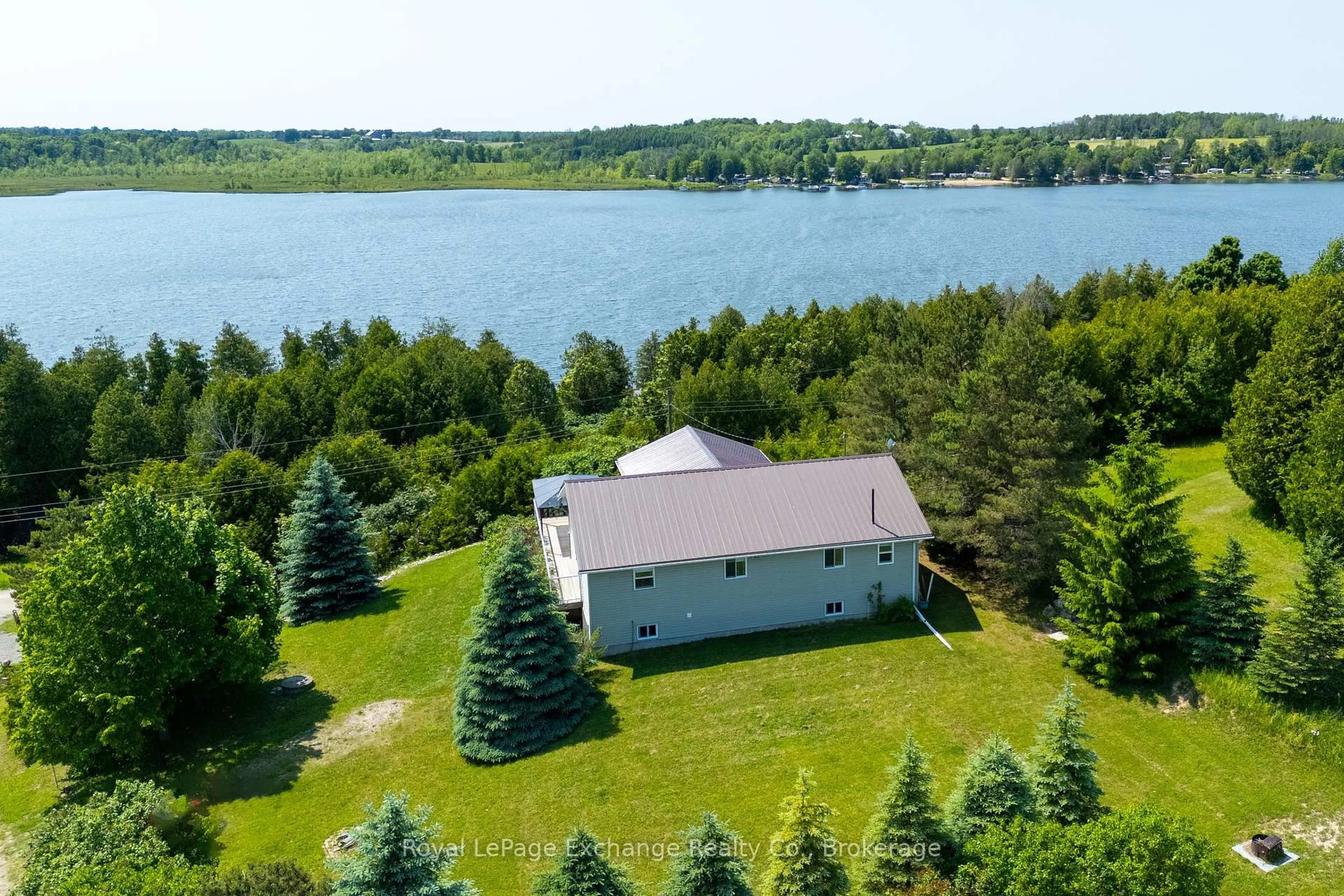 A pic from outside/outdoor area/front of a property/back of a property/a pic from drone, water/lake/river/ocean view for 5 Uranick Lane, Arran-Elderslie Ontario N0H 2N0