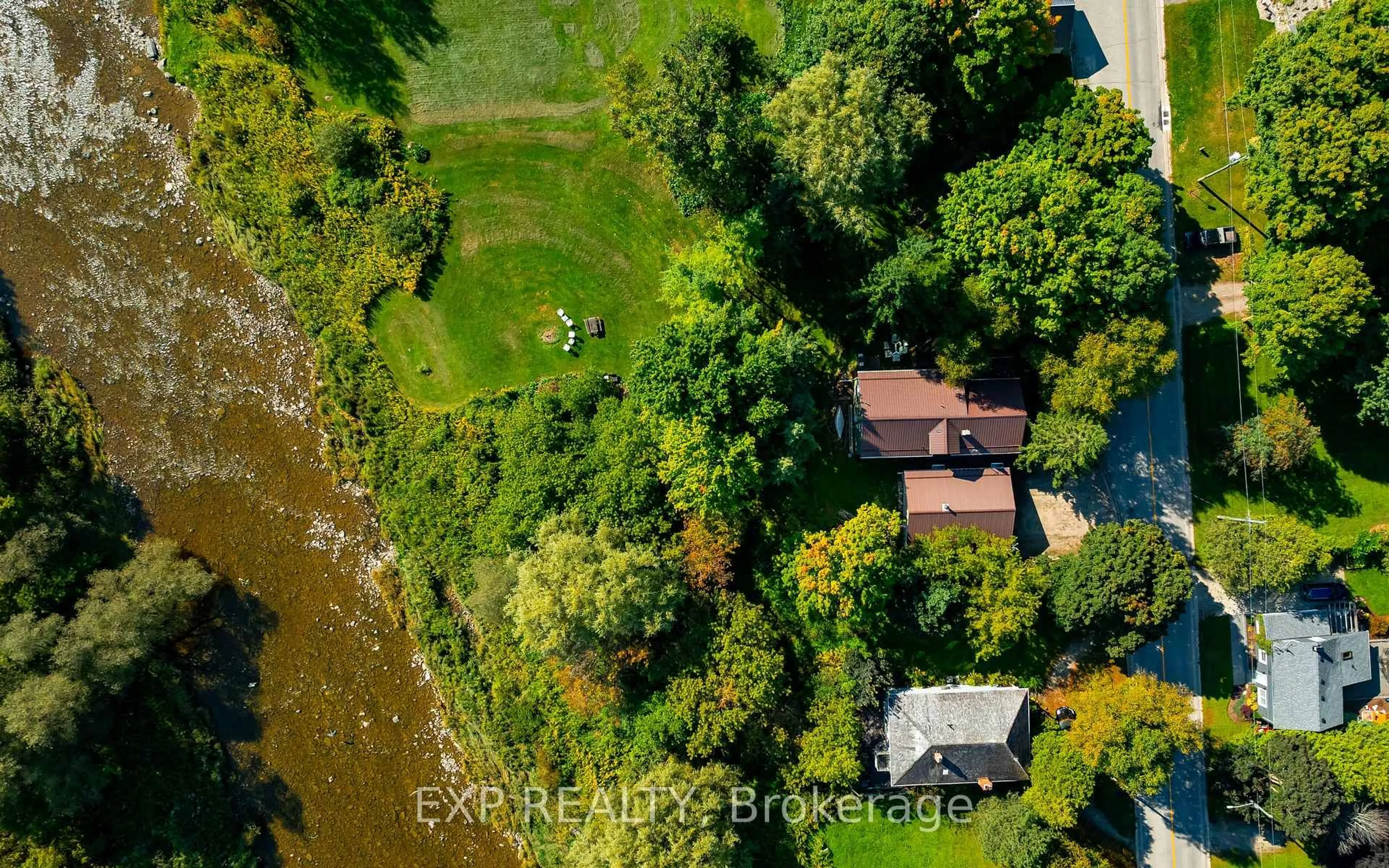 A pic from outside/outdoor area/front of a property/back of a property/a pic from drone, water/lake/river/ocean view for 16 Mill St, Amaranth Ontario L9W 3Z3