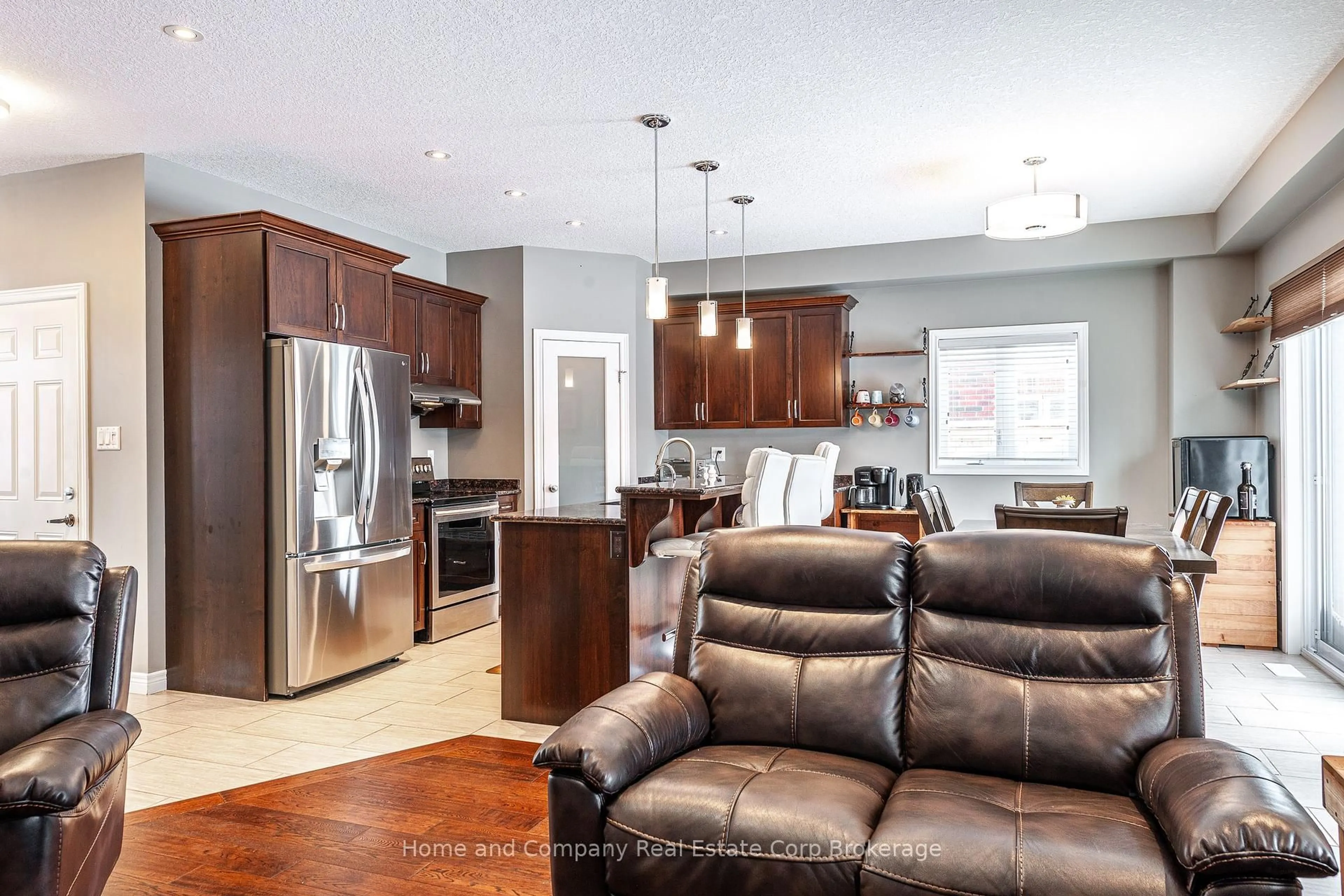 Open concept kitchen, wood/laminate floor for 13 Brown St, Stratford Ontario N5A 0B8
