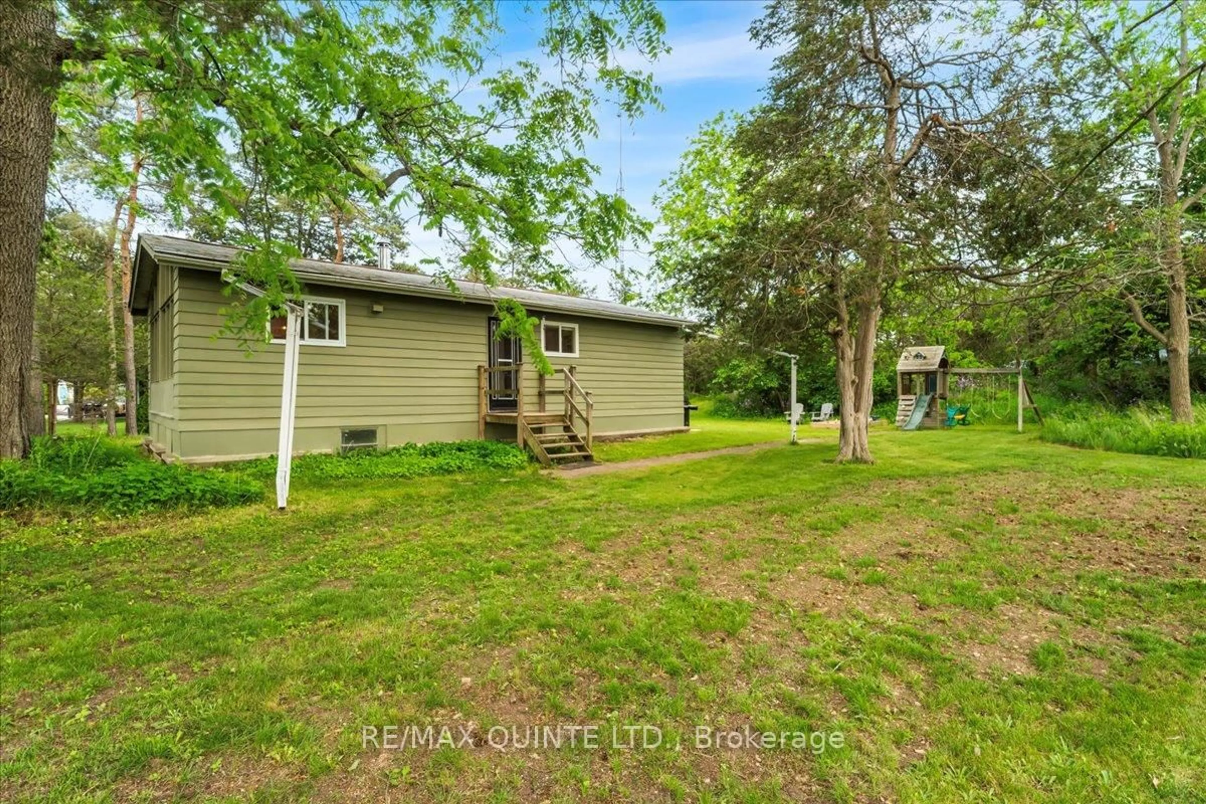 A pic from outside/outdoor area/front of a property/back of a property/a pic from drone, street for 1791 North Big Island Rd, Prince Edward County Ontario K0K 1W0