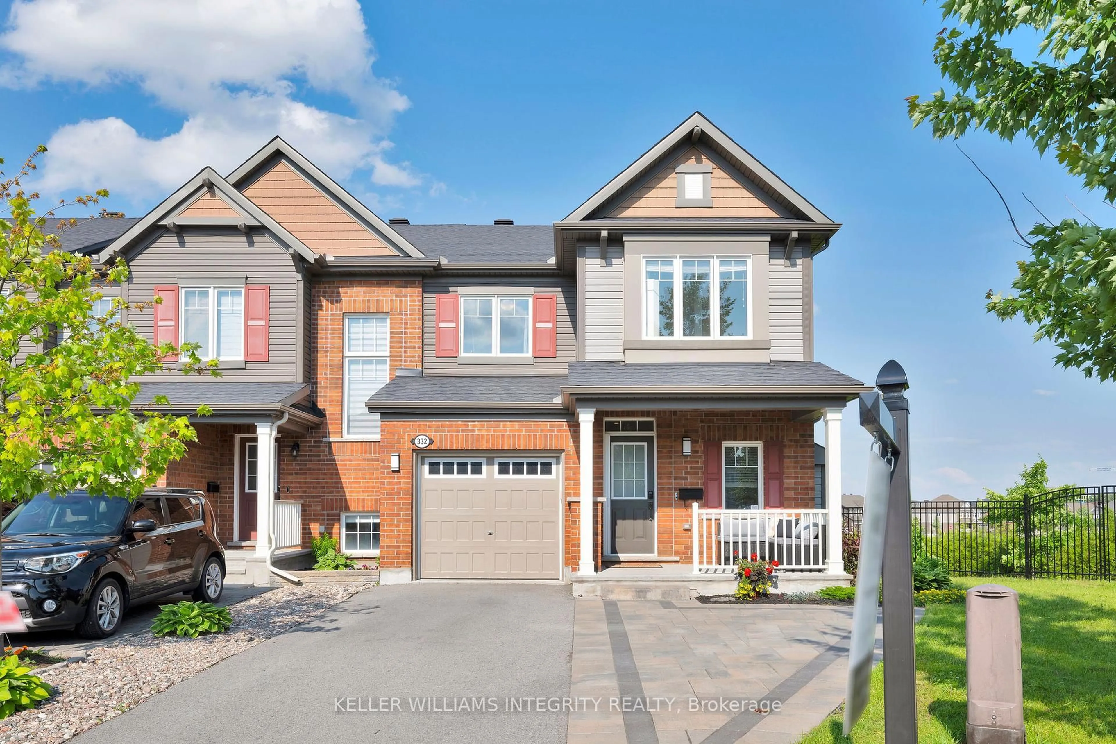 Home with brick exterior material, street for 332 Astelia Cres, Ottawa Ontario K2S 0W7