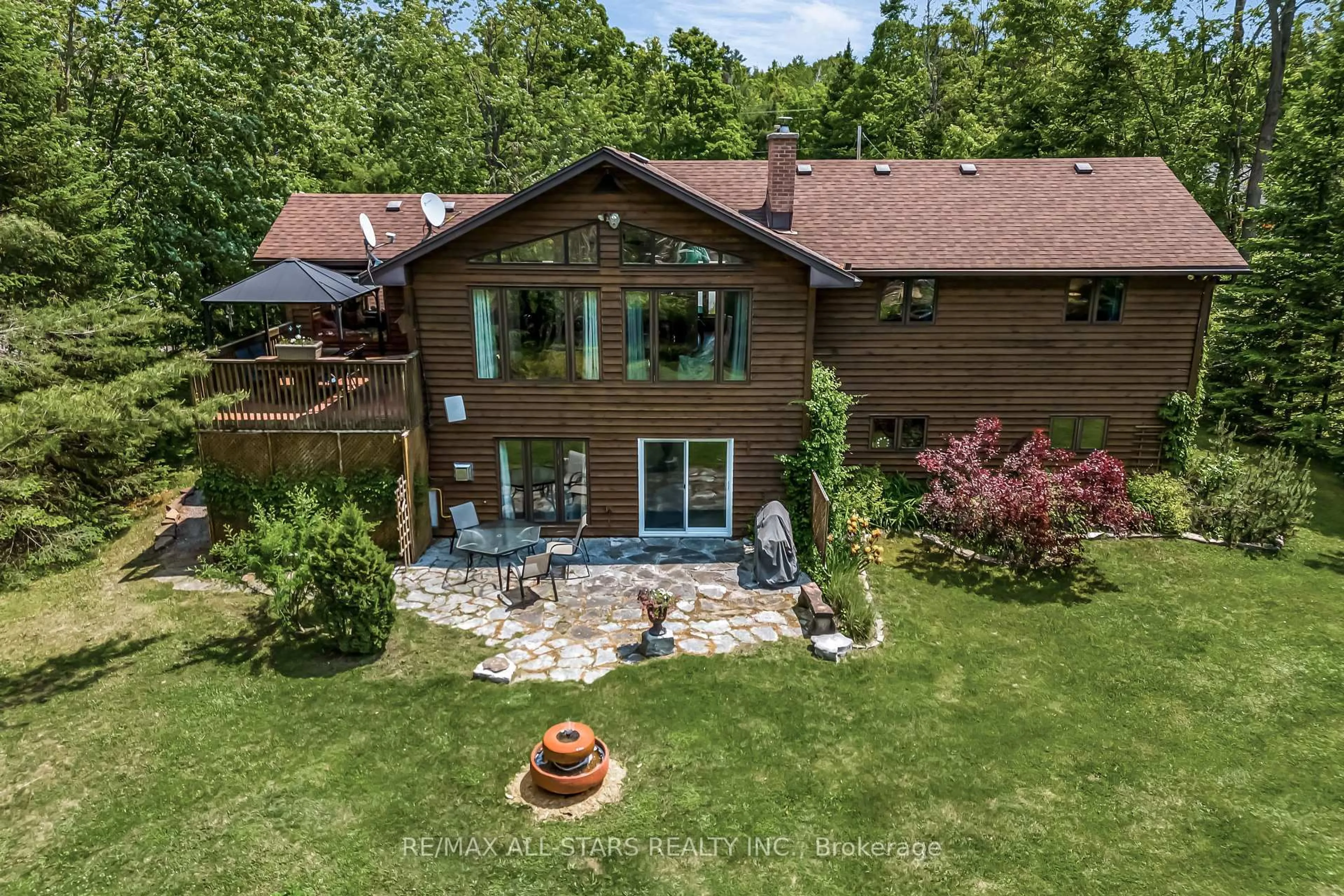 A pic from outside/outdoor area/front of a property/back of a property/a pic from drone, unknown for 98 Edwina Dr, Trent Lakes Ontario K0M 1A0