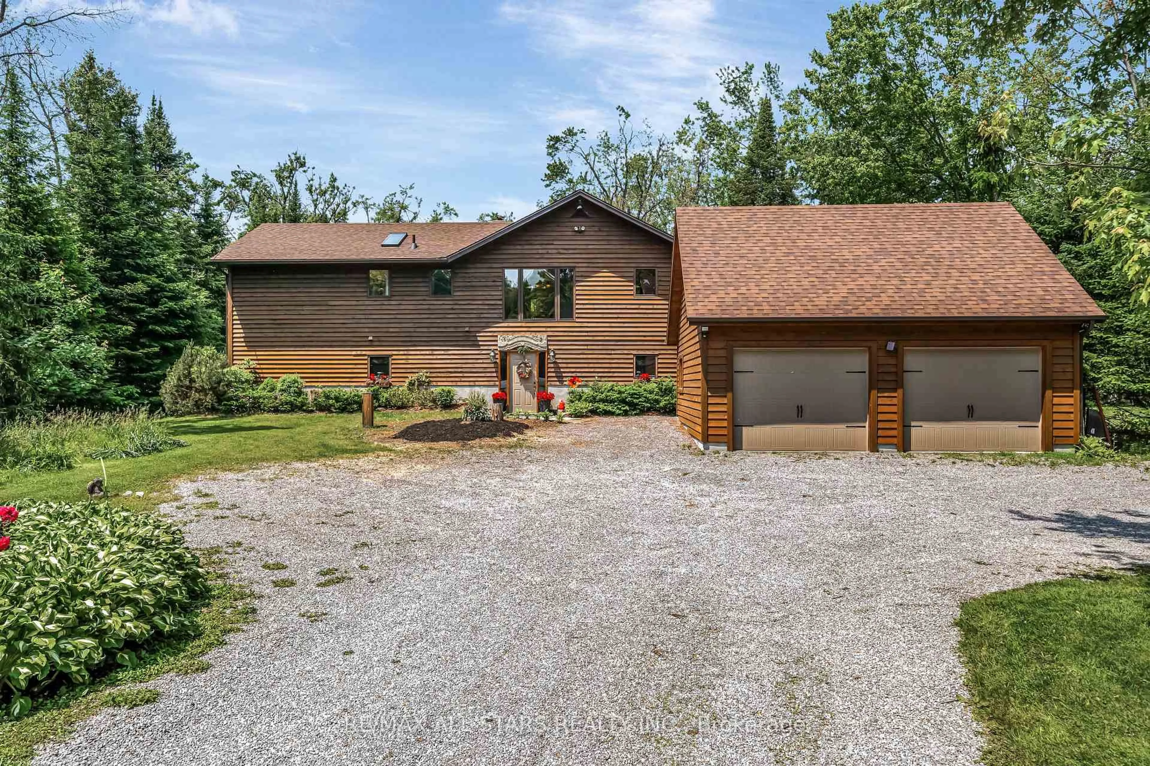 A pic from outside/outdoor area/front of a property/back of a property/a pic from drone, unknown for 98 Edwina Dr, Trent Lakes Ontario K0M 1A0