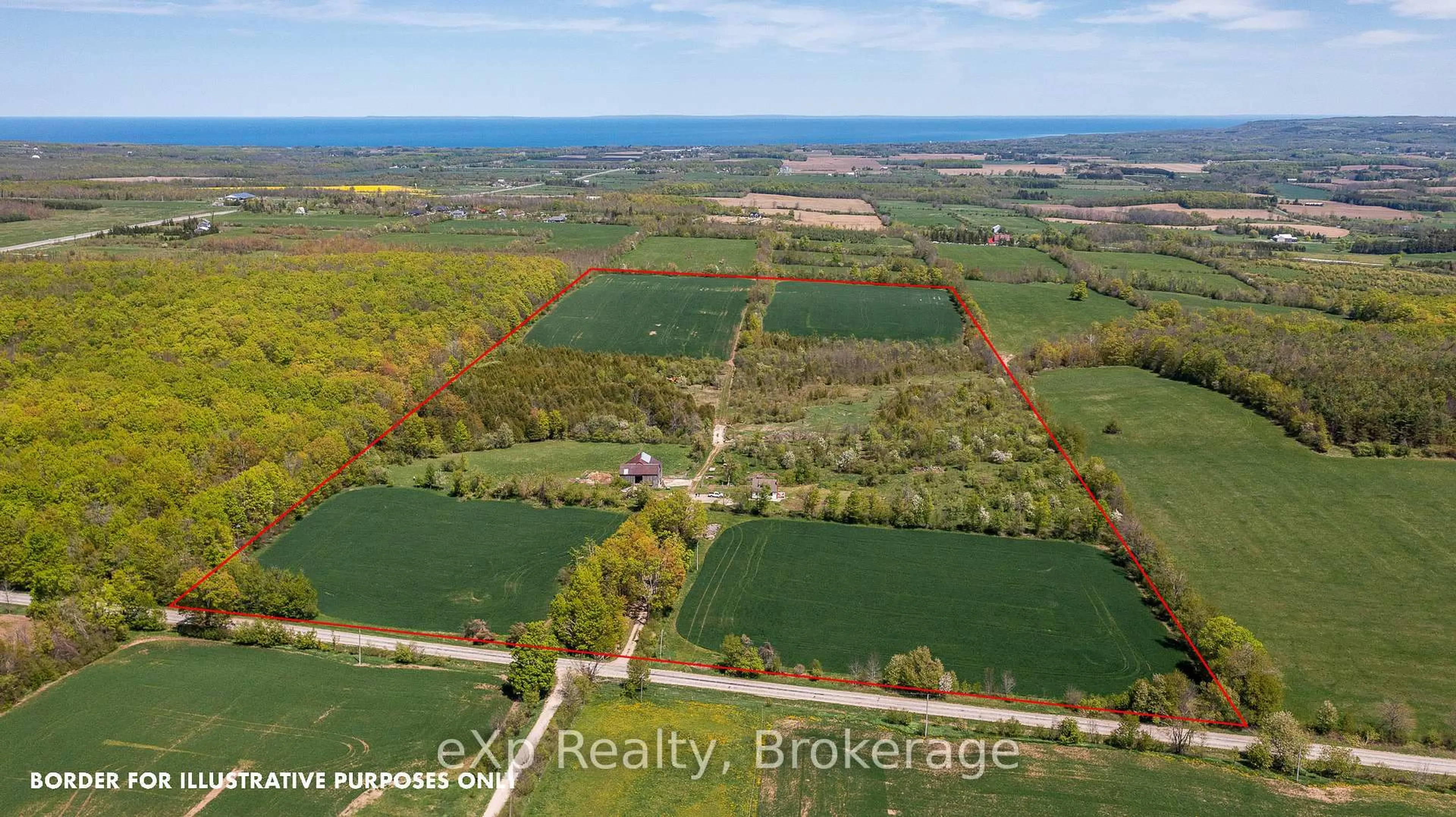 A pic from outside/outdoor area/front of a property/back of a property/a pic from drone, water/lake/river/ocean view for 58111 12th Line, Meaford Ontario N4L 1W5