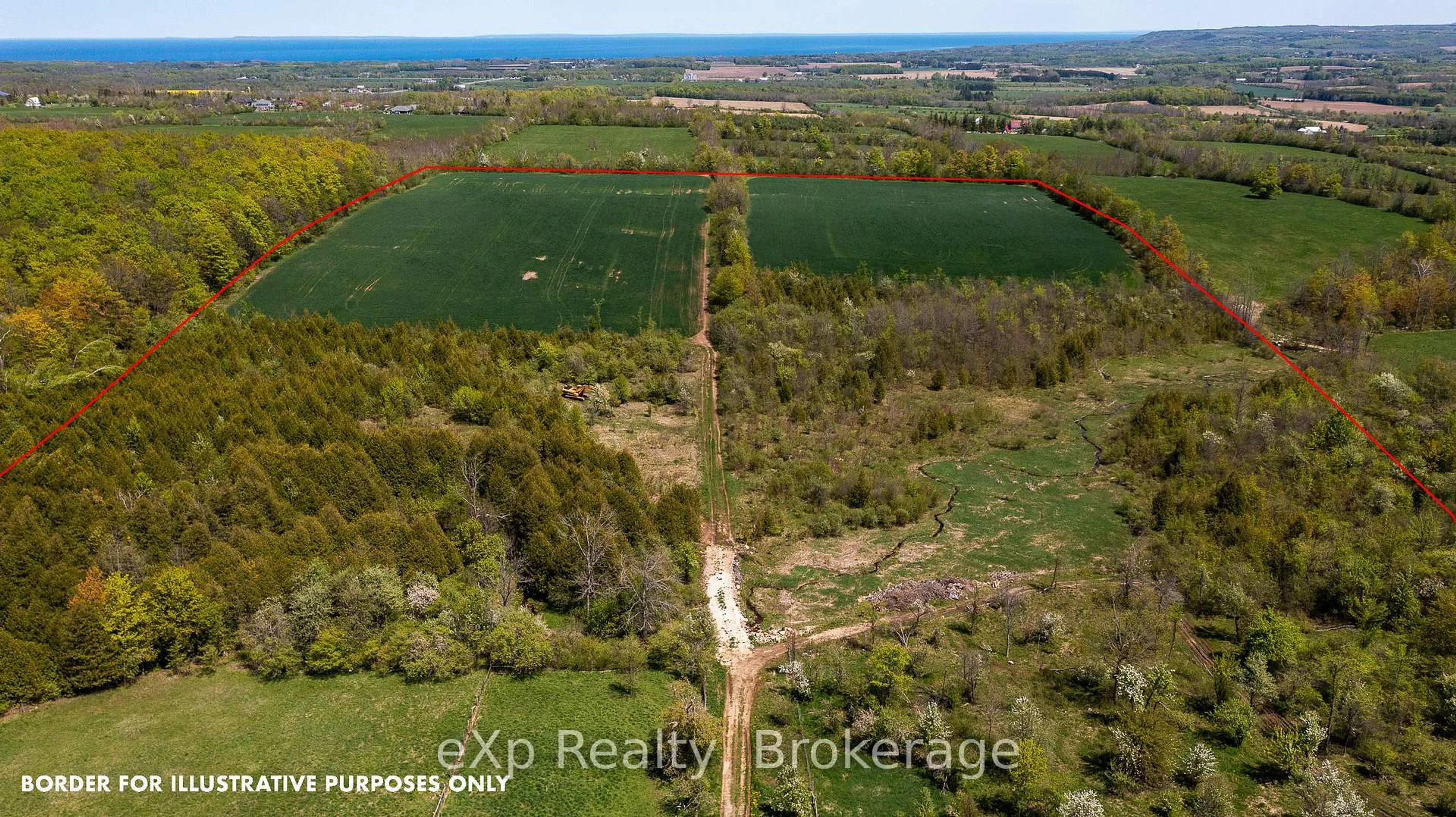 A pic from outside/outdoor area/front of a property/back of a property/a pic from drone, forest/trees view for 58111 12th Line, Meaford Ontario N4L 1W5