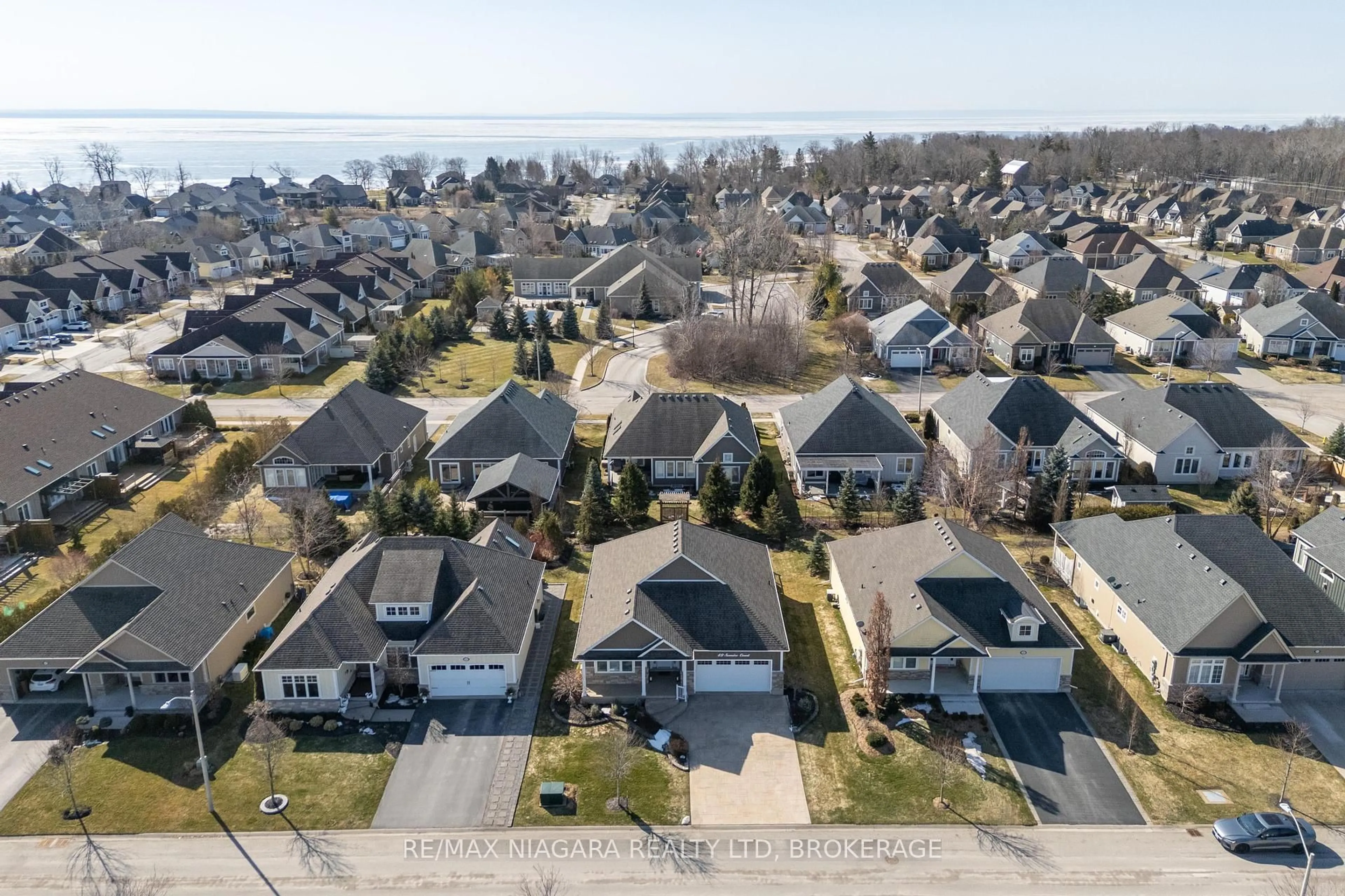 A pic from outside/outdoor area/front of a property/back of a property/a pic from drone, street for 49 Sunrise Crt, Fort Erie Ontario L0S 1N0