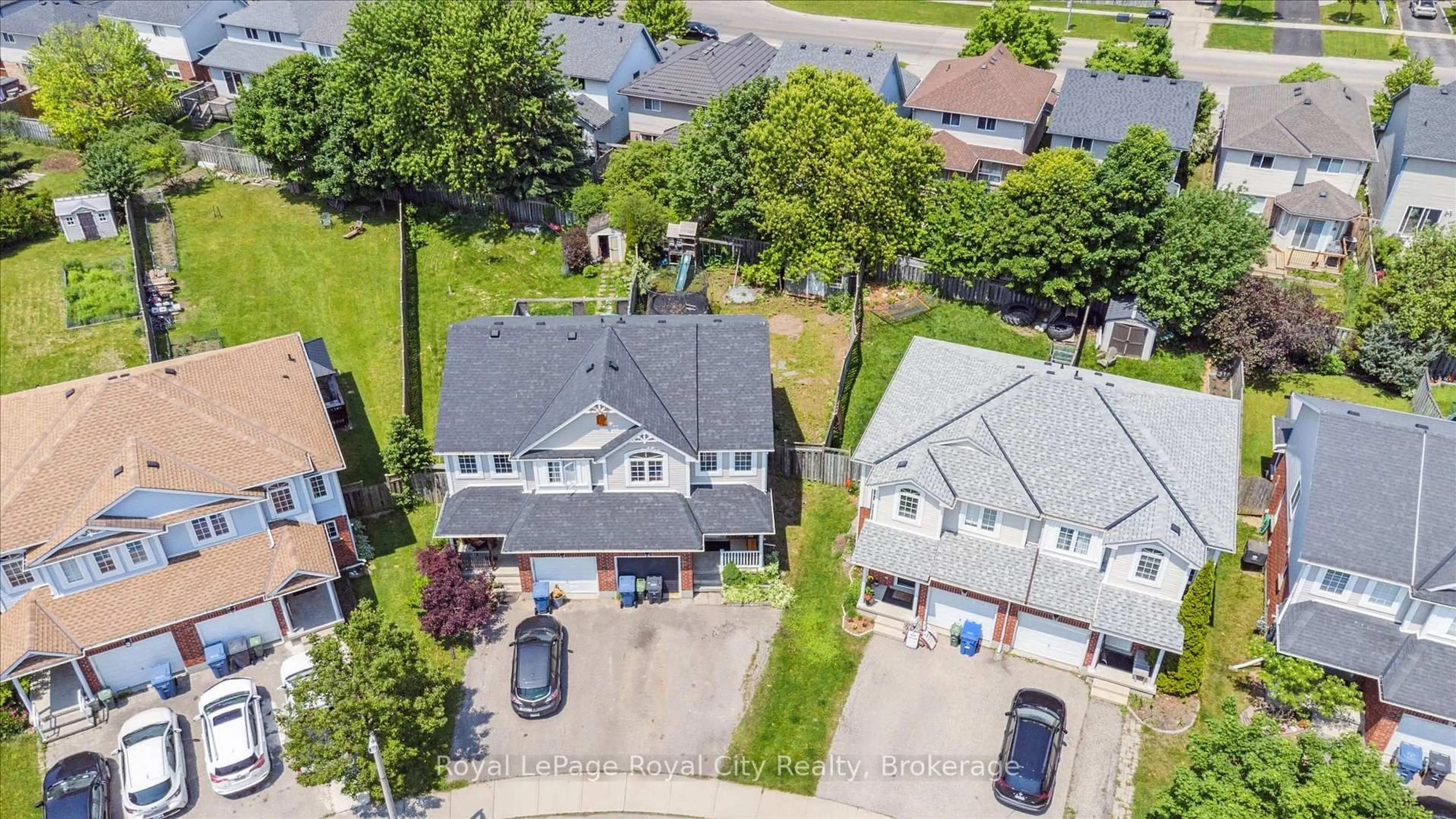 A pic from outside/outdoor area/front of a property/back of a property/a pic from drone, street for 86 Swift Cres, Guelph Ontario N1E 7J1