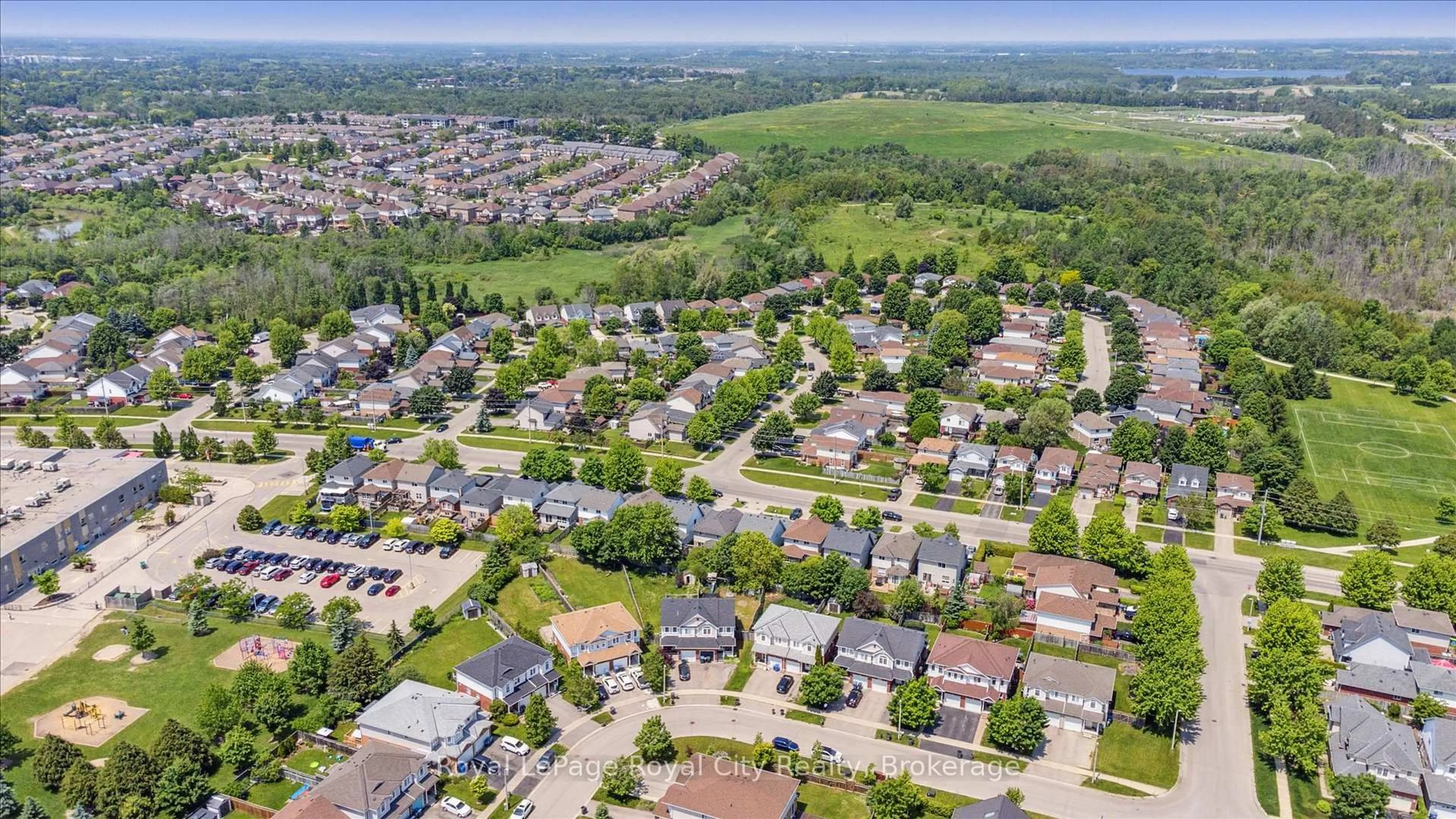 A pic from outside/outdoor area/front of a property/back of a property/a pic from drone, street for 86 Swift Cres, Guelph Ontario N1E 7J1