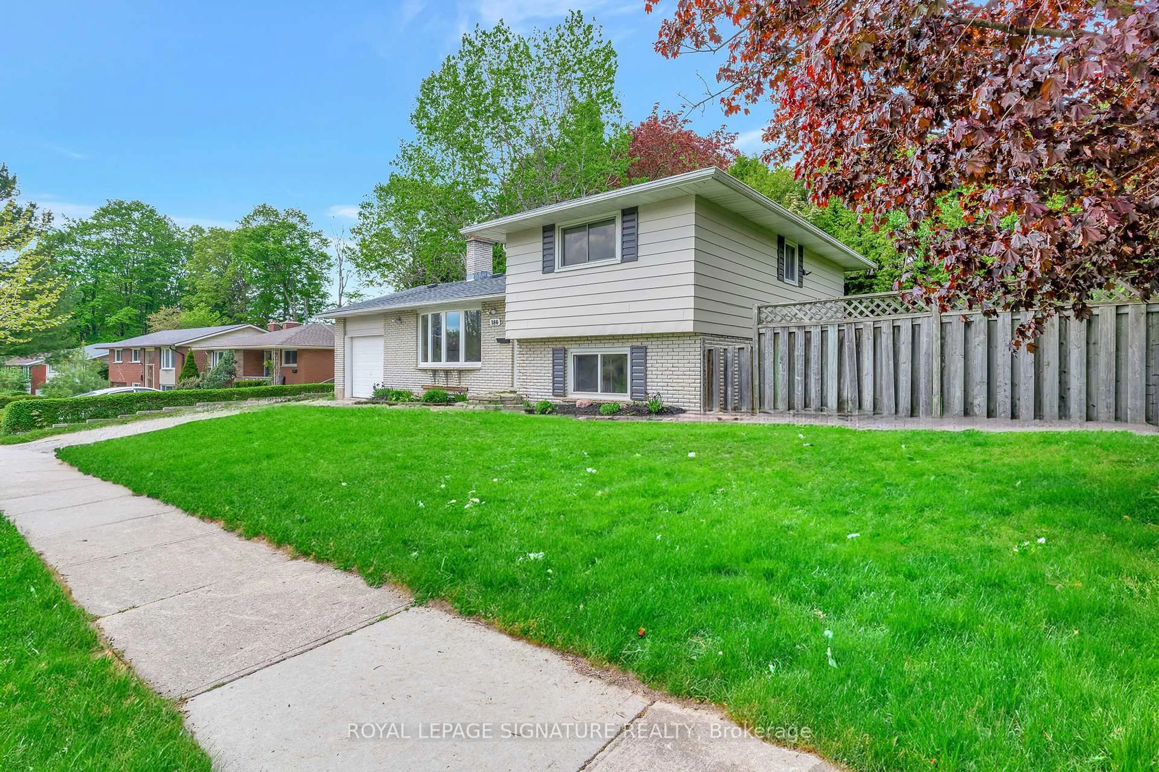 Home with vinyl exterior material, street for 186 Cedarbrae Ave, Waterloo Ontario N2L 4S5