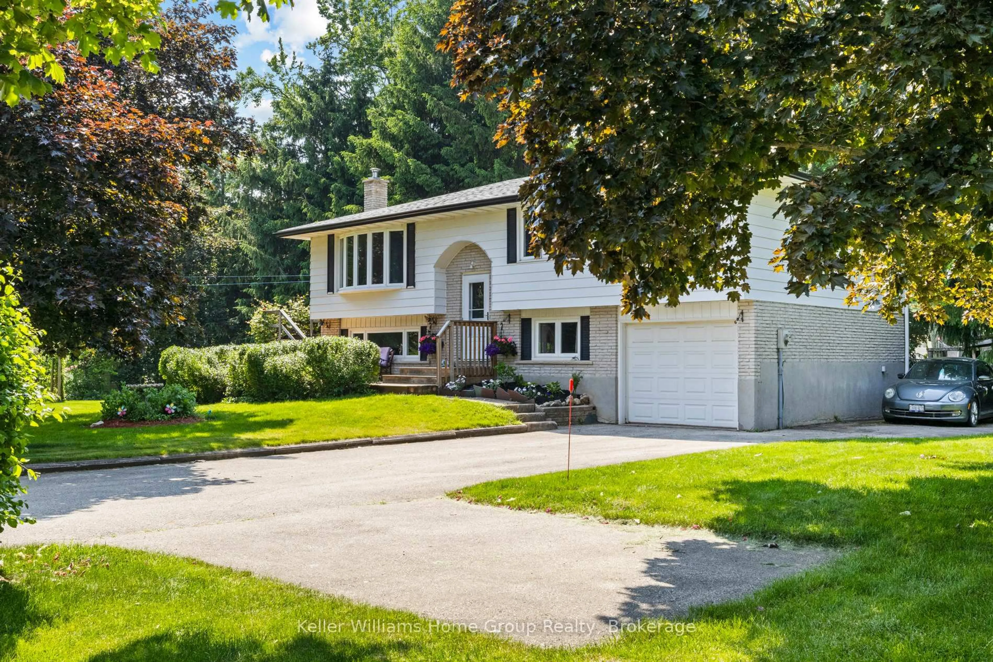 Home with vinyl exterior material, street for 7392 Wellington Rd 51 Rd, Guelph/Eramosa Ontario N0B 1B0