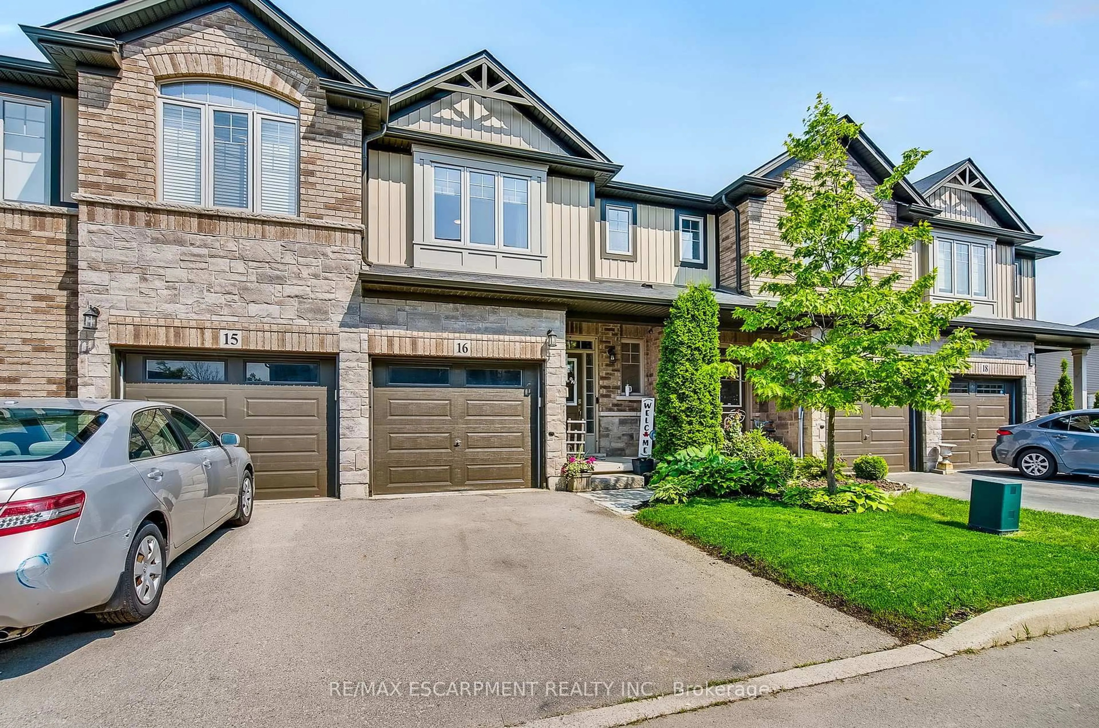 Home with brick exterior material, street for 247 Festival Way #16, Hamilton Ontario L0R 1C0