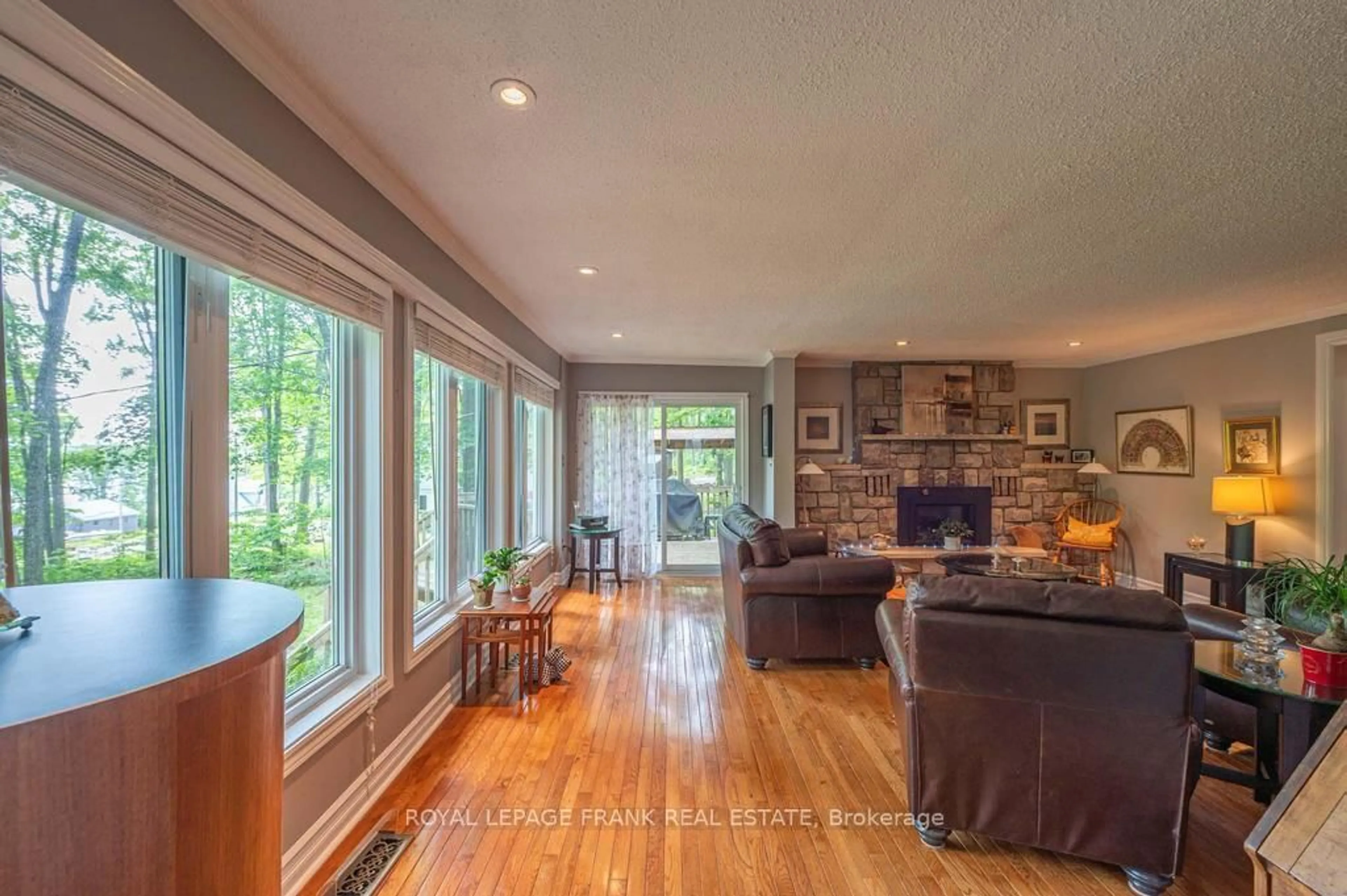 Living room with furniture, wood/laminate floor for 3 Fire Route 27B, Trent Lakes Ontario K0L 1J0