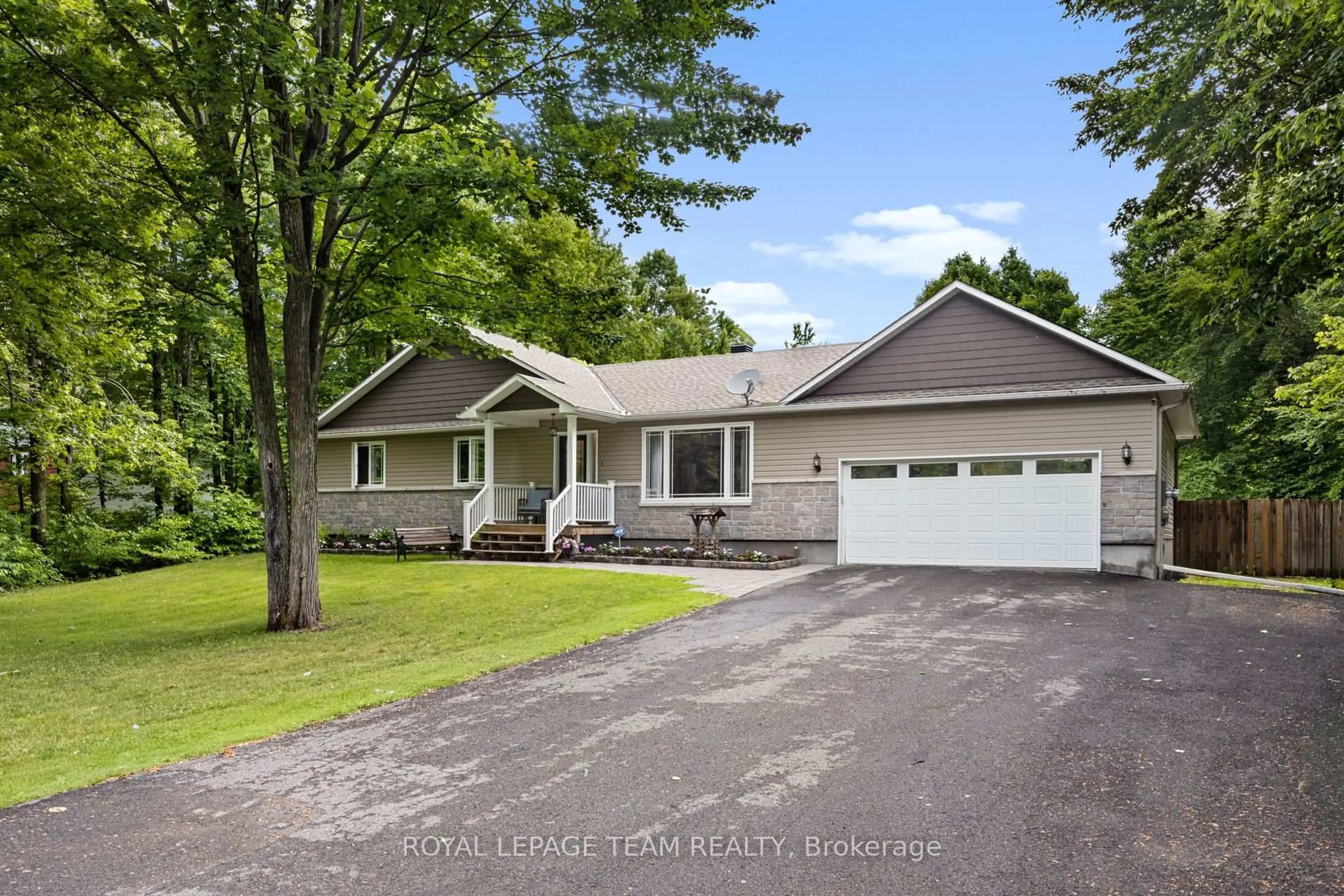 Home with vinyl exterior material, street for 3301 Wild Cherry Dr, Osgoode Ontario K0A 2W0