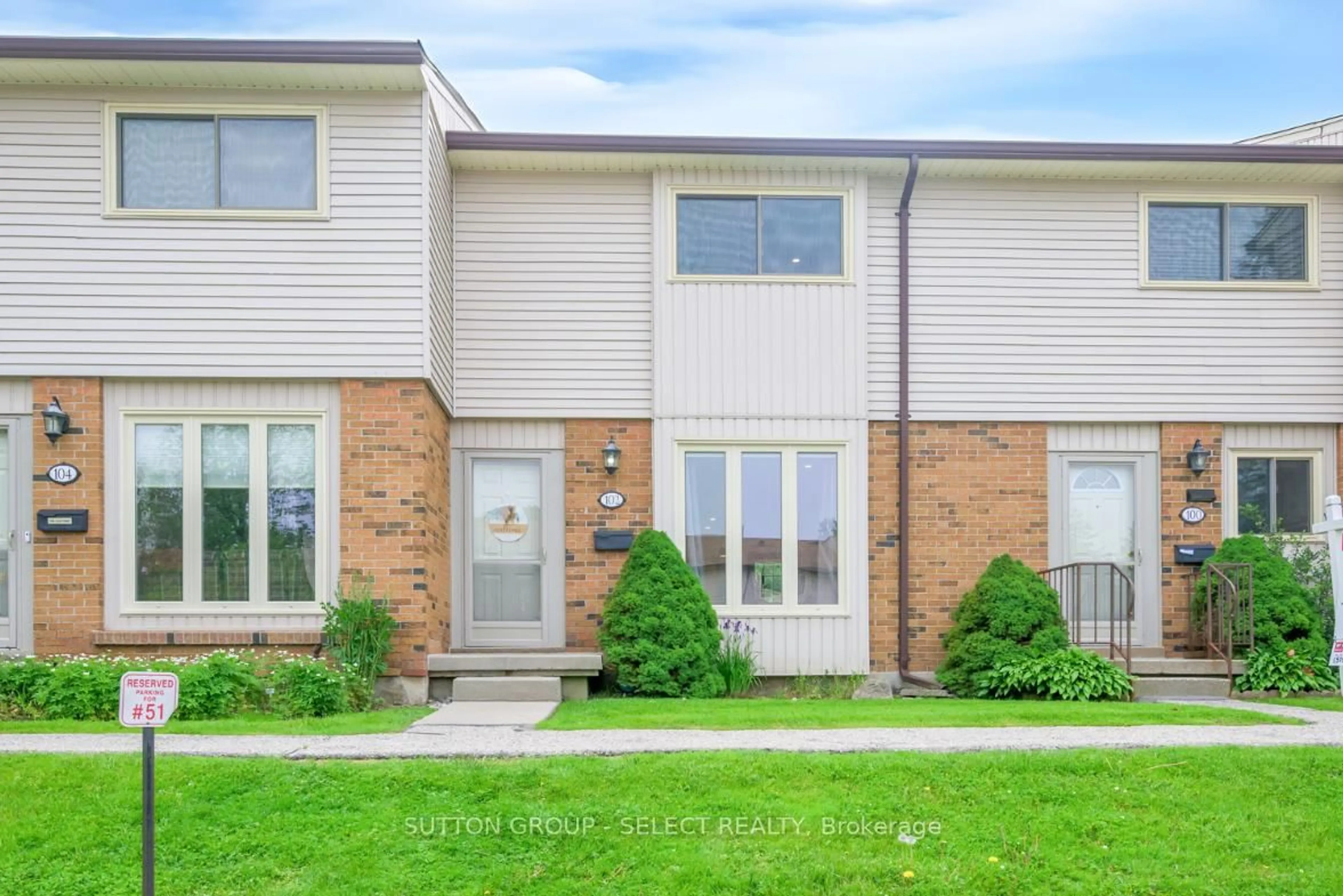 Home with brick exterior material, street for 1328 Commissioners Rd #102, London South Ontario N6K 2Y6