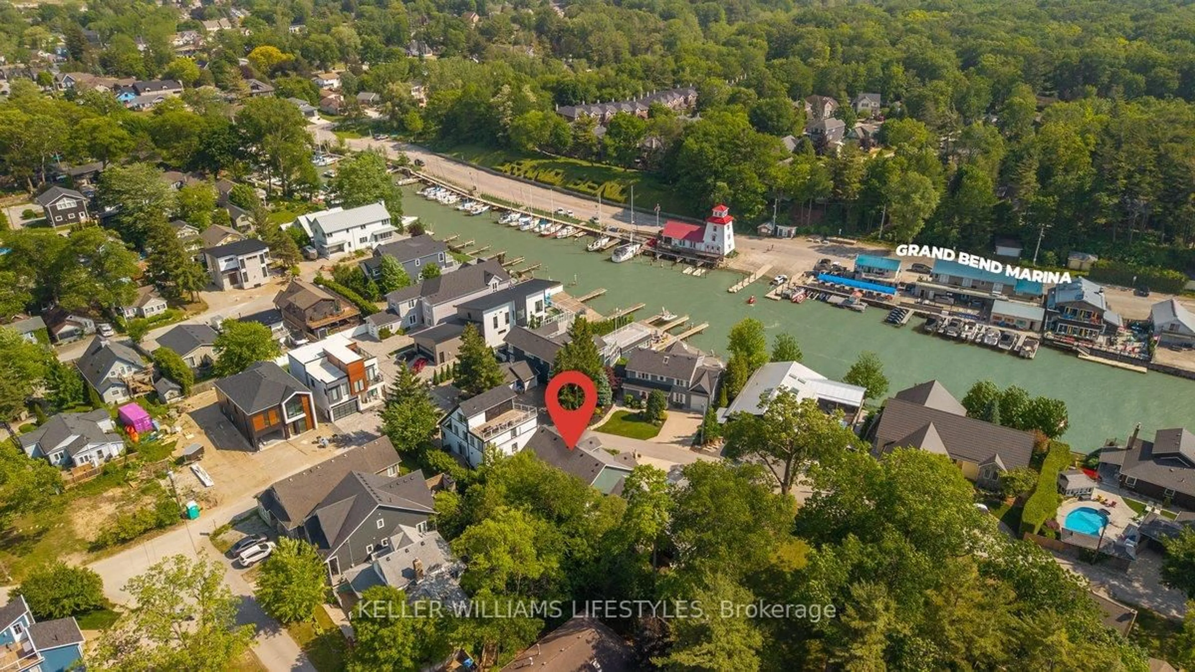 A pic from outside/outdoor area/front of a property/back of a property/a pic from drone, water/lake/river/ocean view for 40 Lakeside Circ, Lambton Shores Ontario N0M 1T0