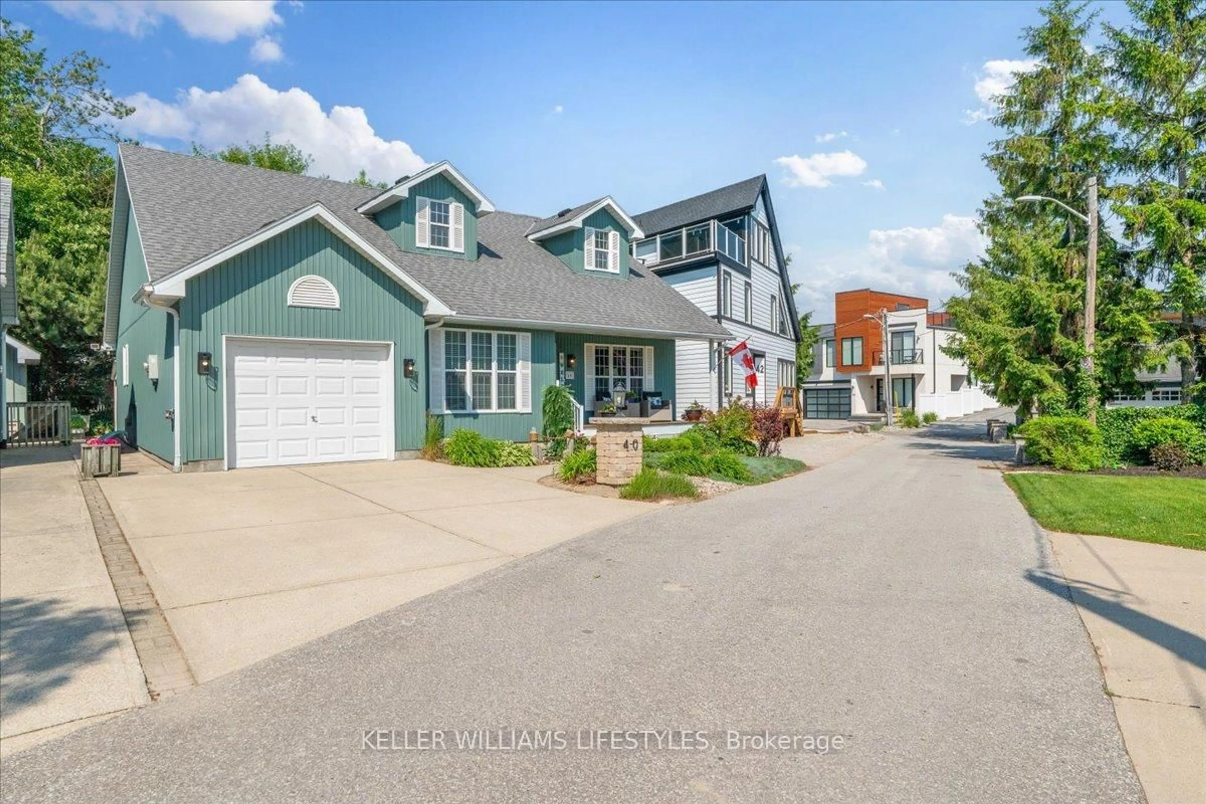 A pic from outside/outdoor area/front of a property/back of a property/a pic from drone, street for 40 Lakeside Circ, Lambton Shores Ontario N0M 1T0