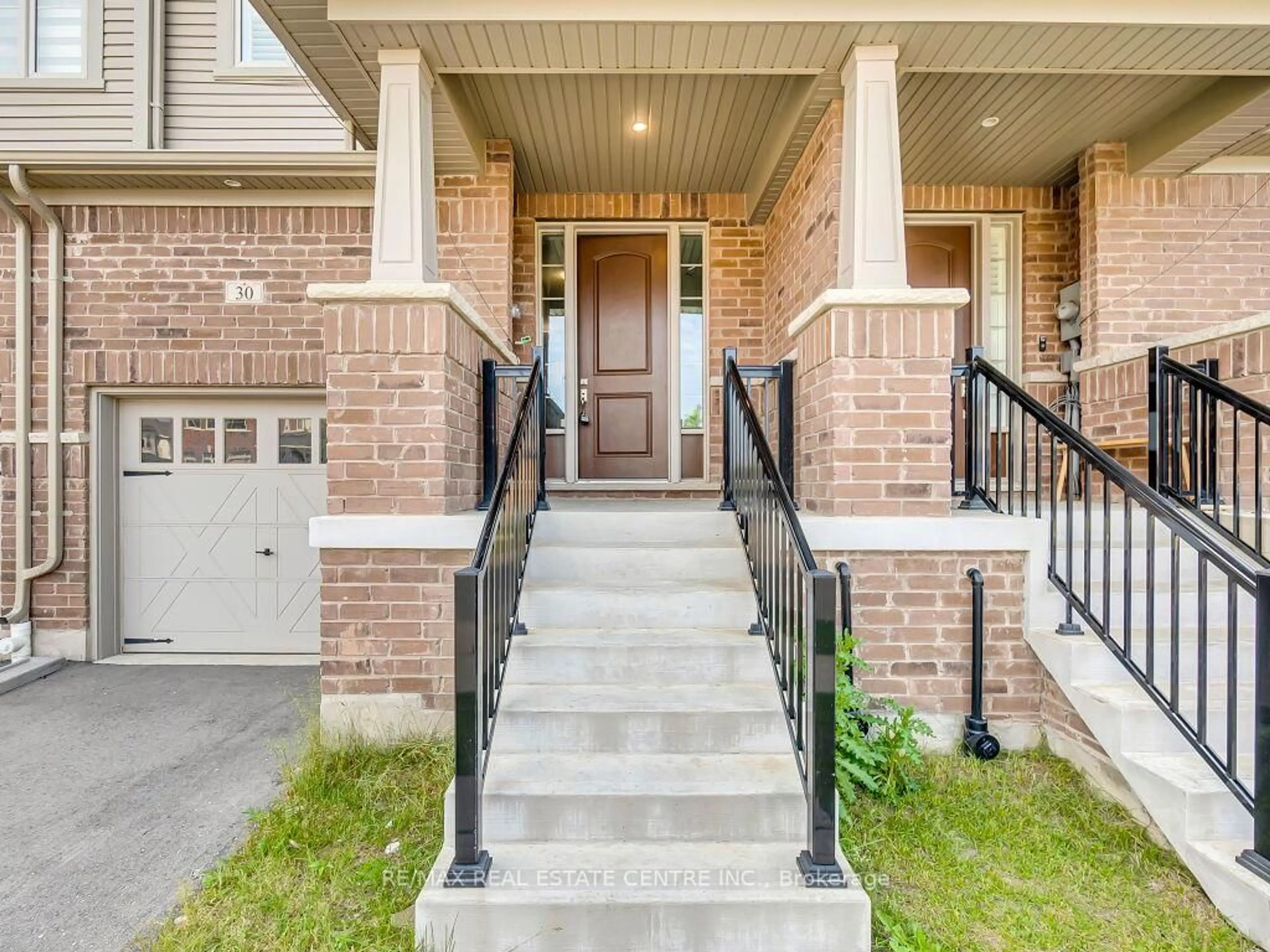 Home with brick exterior material, street for 30 Grassbourne Ave, Kitchener Ontario N2R 0R1