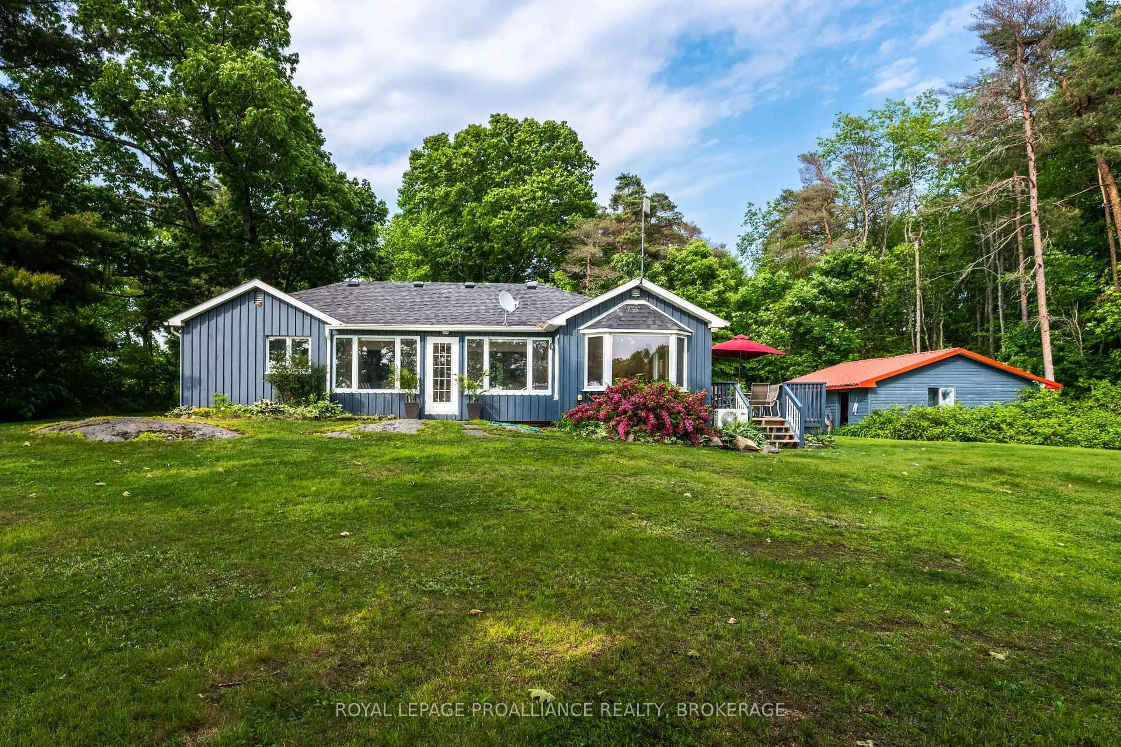 A pic from outside/outdoor area/front of a property/back of a property/a pic from drone, water/lake/river/ocean view for 4788 Leo Lake Rd, Seeley's Bay Ontario K0H 2N0