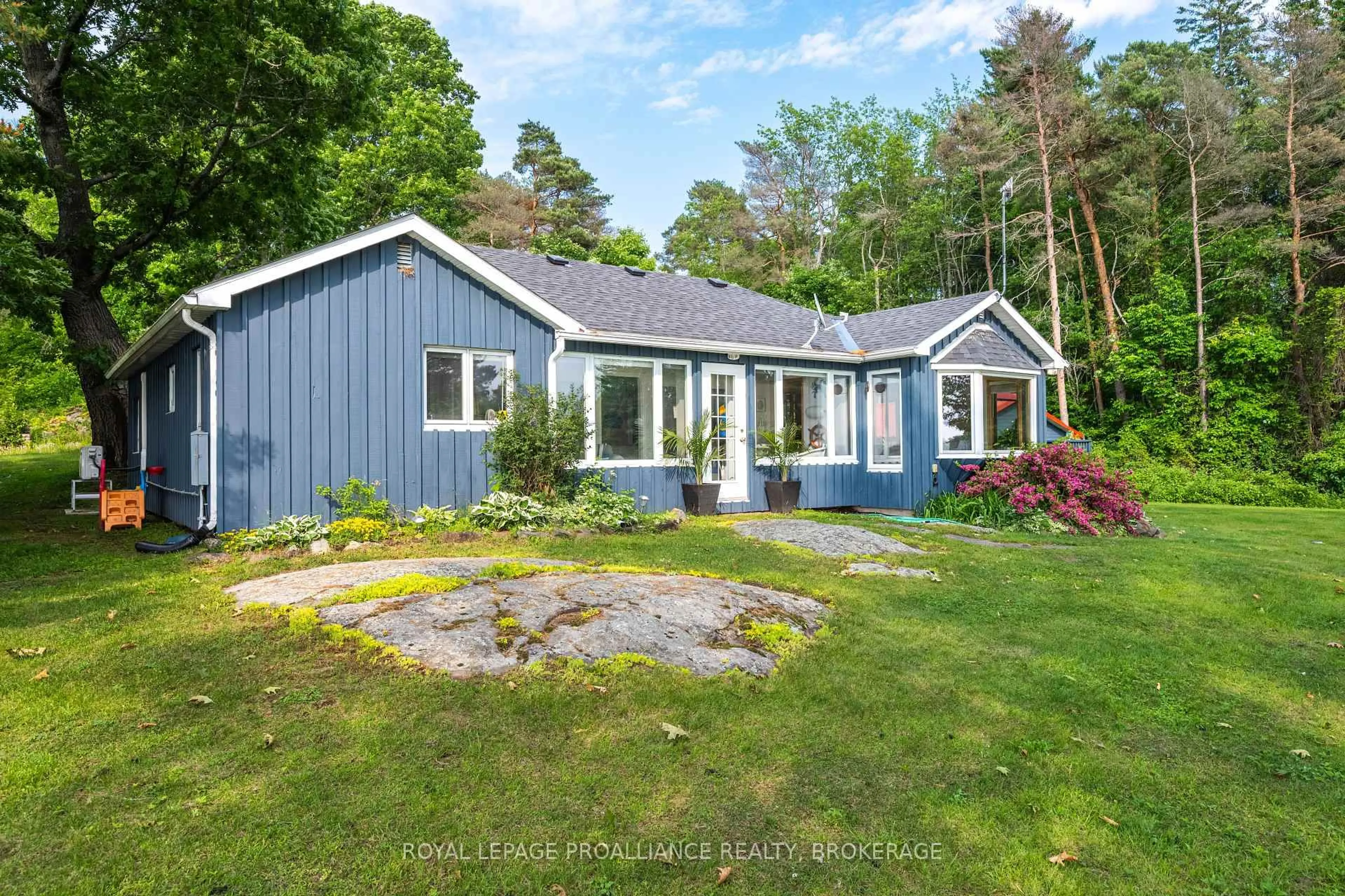 A pic from outside/outdoor area/front of a property/back of a property/a pic from drone, unknown for 4788 Leo Lake Rd, Seeley's Bay Ontario K0H 2N0