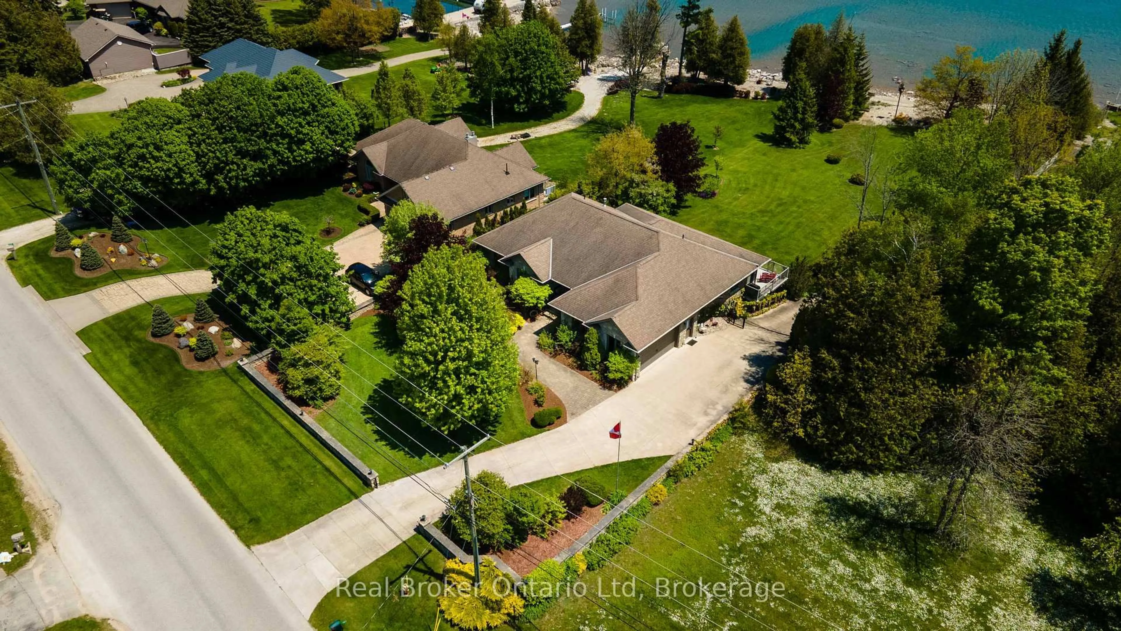 A pic from outside/outdoor area/front of a property/back of a property/a pic from drone, water/lake/river/ocean view for 361 Balmy Beach Rd, Georgian Bluffs Ontario N4K 5N4