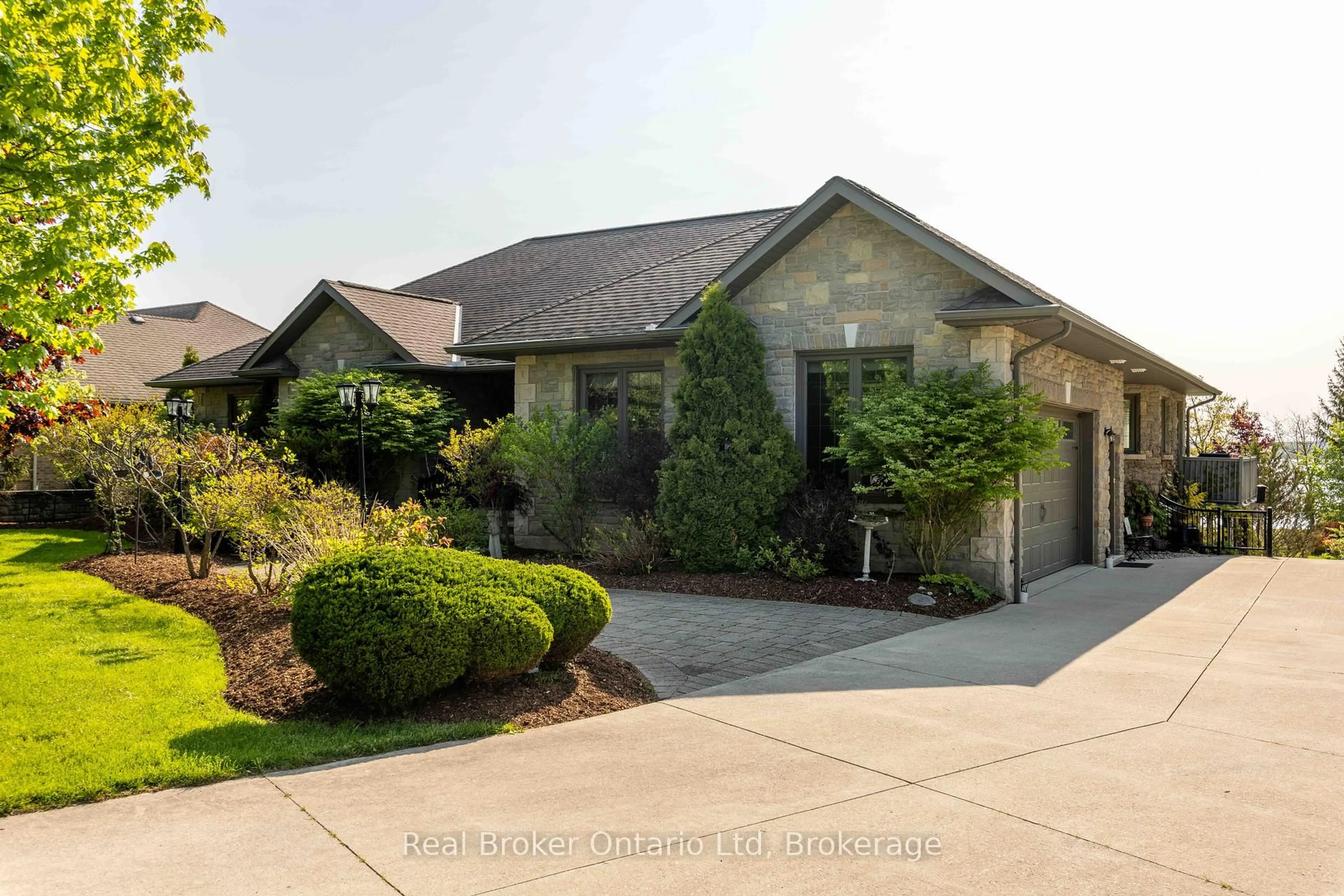 Home with brick exterior material, street for 361 Balmy Beach Rd, Georgian Bluffs Ontario N4K 5N4