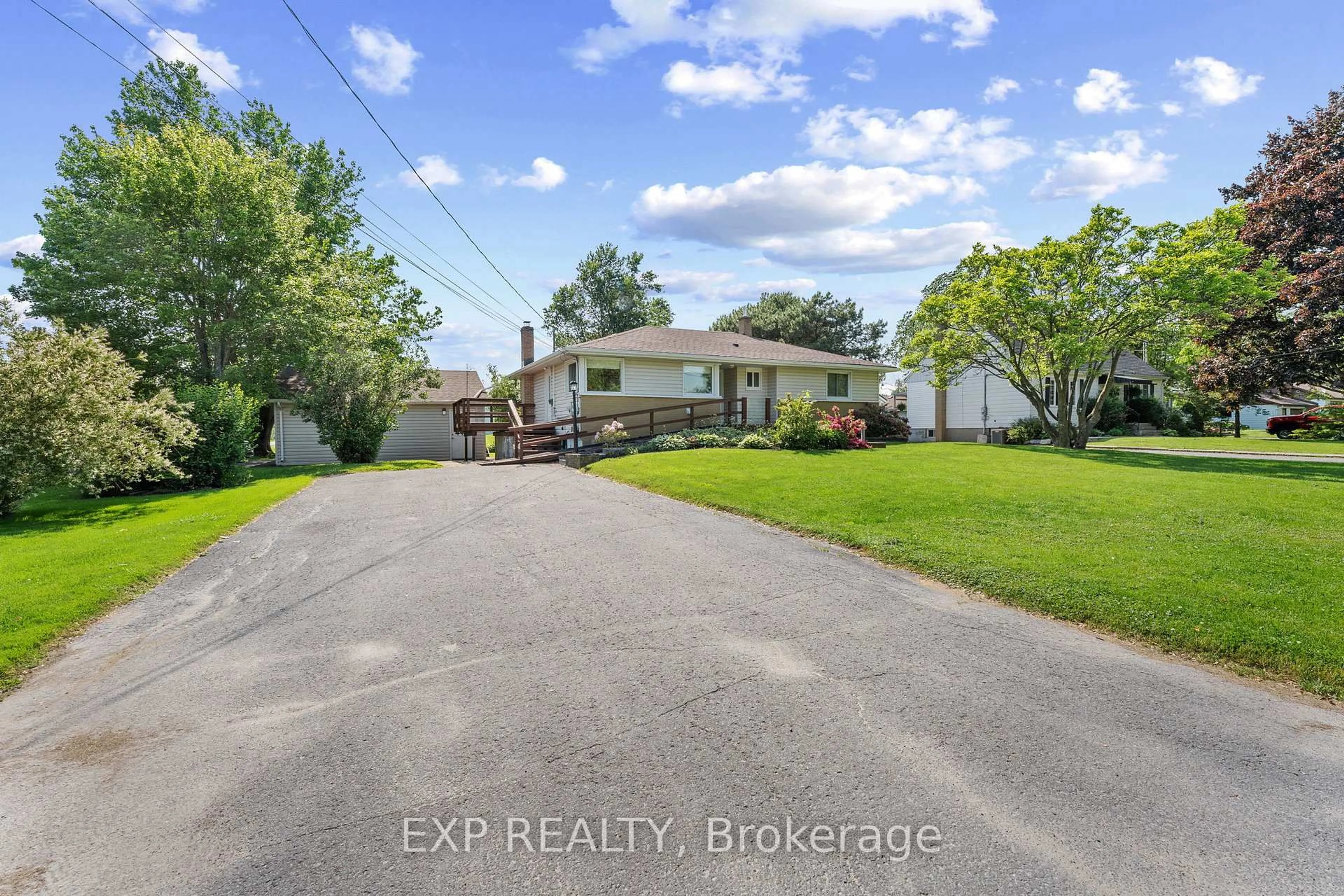 A pic from outside/outdoor area/front of a property/back of a property/a pic from drone, water/lake/river/ocean view for 450 Coronation Blvd, Amherstview Ontario K7M 5P9