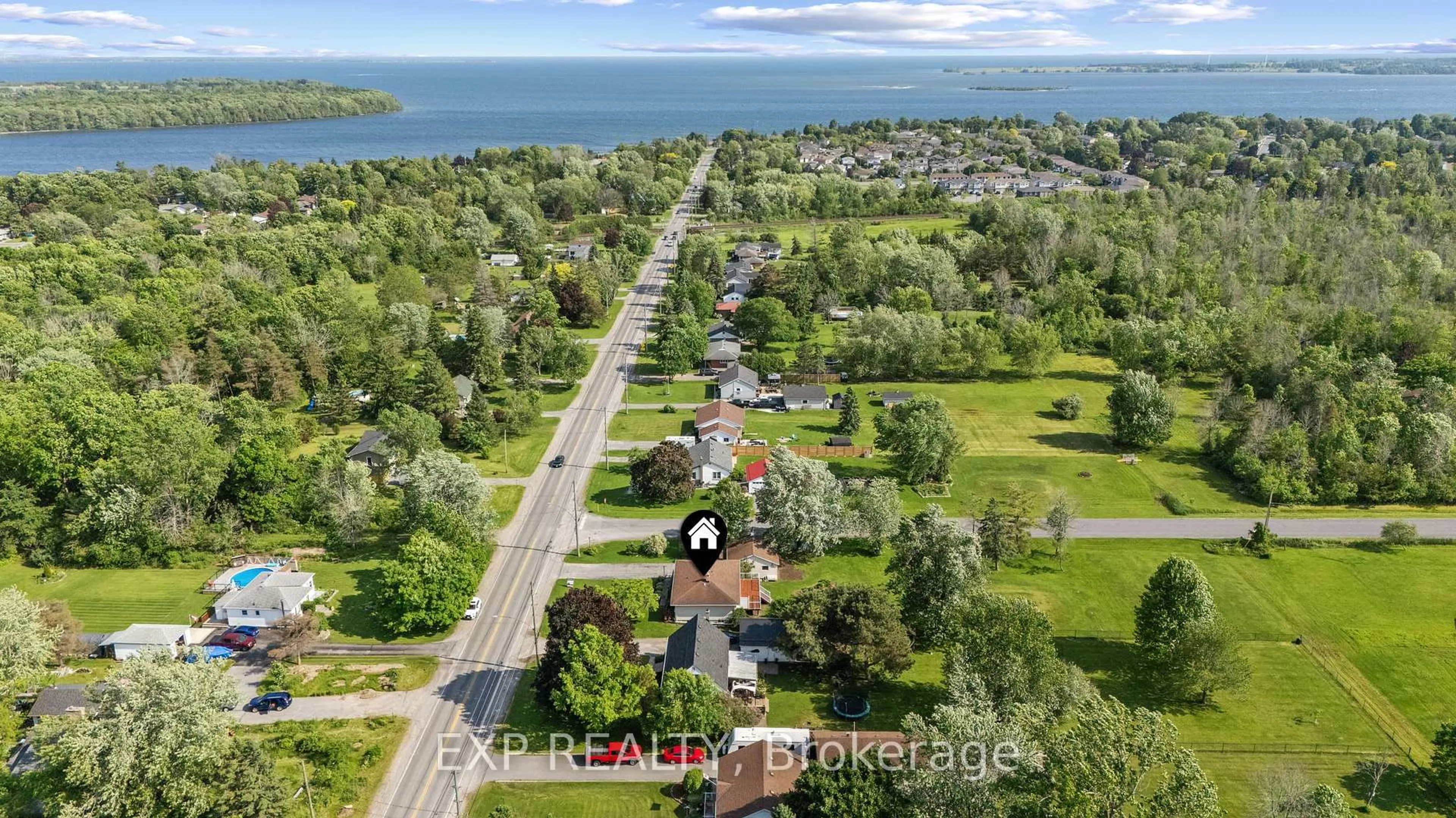 A pic from outside/outdoor area/front of a property/back of a property/a pic from drone, water/lake/river/ocean view for 450 Coronation Blvd, Amherstview Ontario K7M 5P9