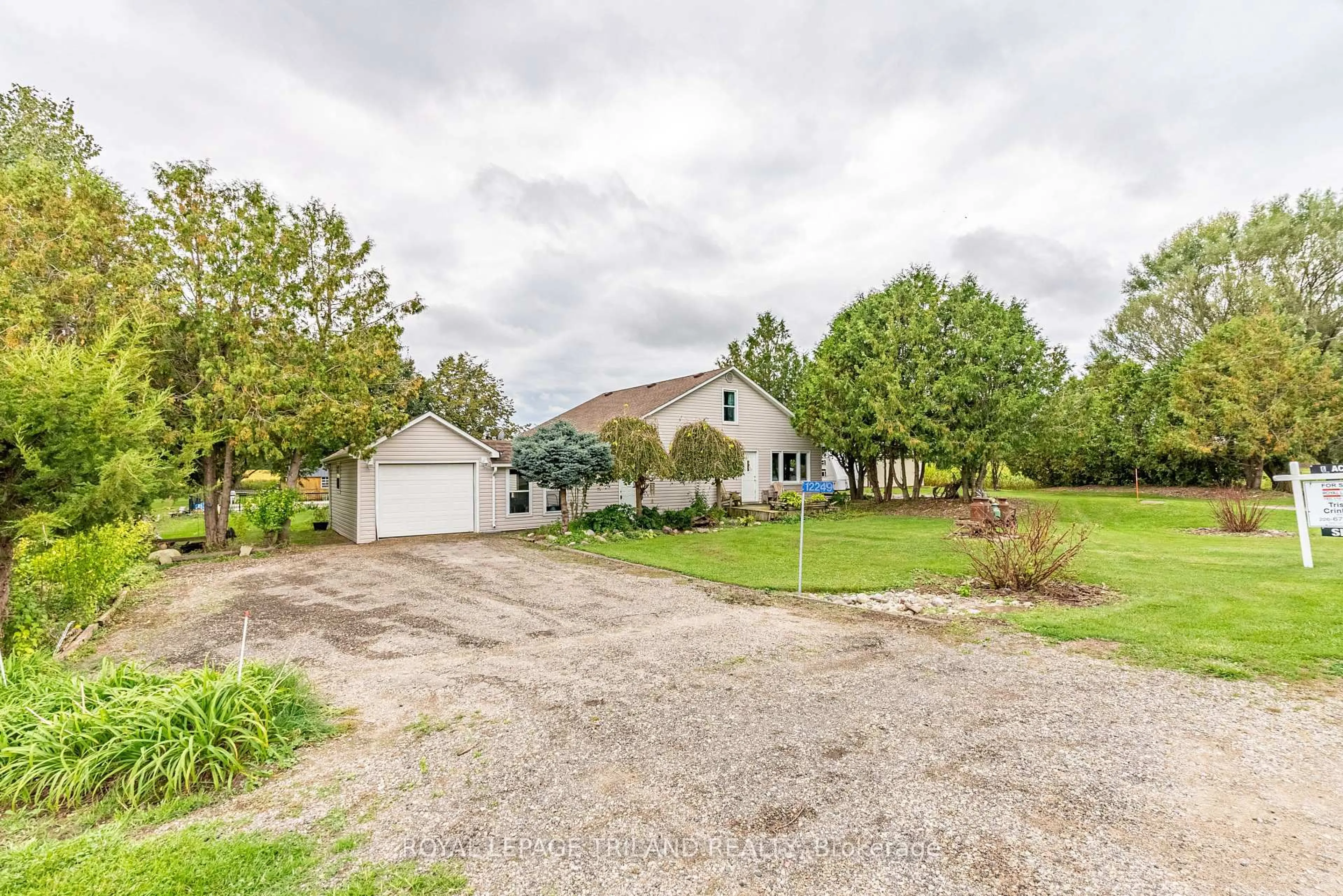 A pic from outside/outdoor area/front of a property/back of a property/a pic from drone, street for 12249 Mill Rd, Southwold Ontario N0L 2G0