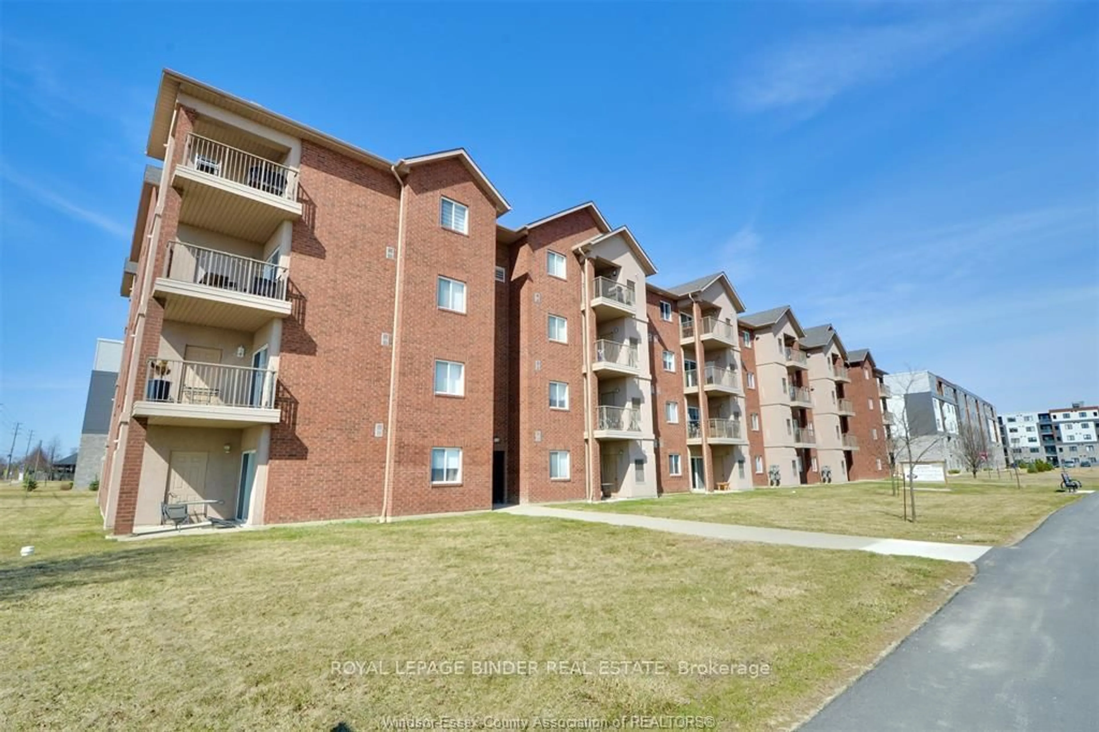 A pic from outside/outdoor area/front of a property/back of a property/a pic from drone, unknown for 2650 Sandwich Pkwy #107, LaSalle Ontario N9H 0A7