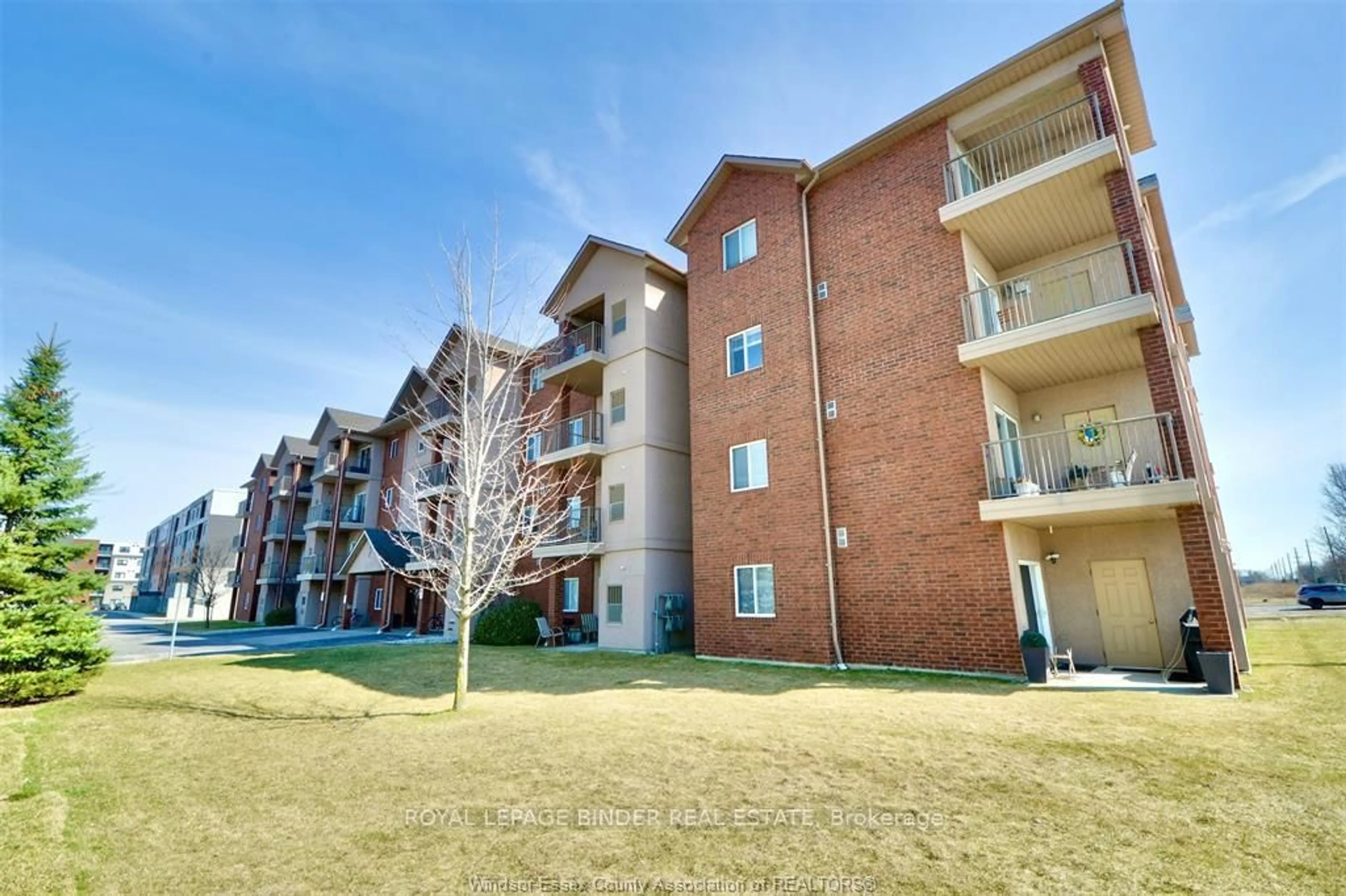 A pic from outside/outdoor area/front of a property/back of a property/a pic from drone, unknown for 2650 Sandwich Pkwy #107, LaSalle Ontario N9H 0A7