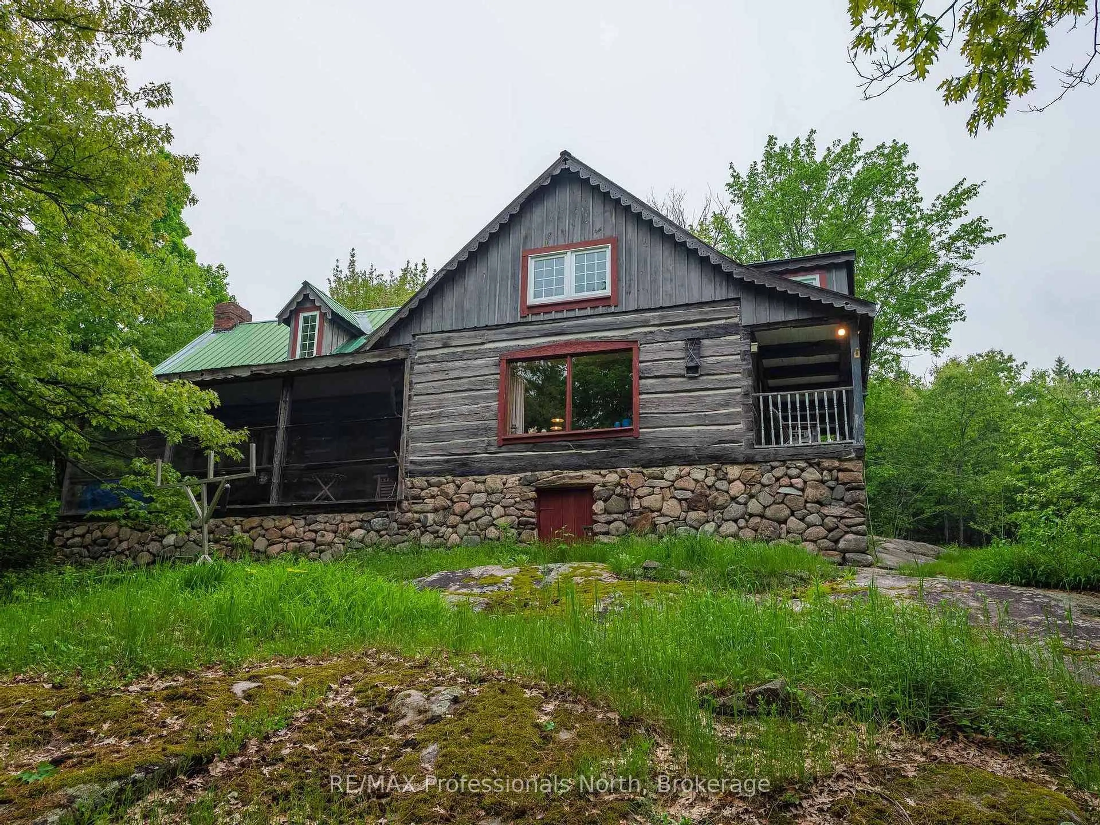 A pic from outside/outdoor area/front of a property/back of a property/a pic from drone, unknown for 1129 Koshlong Lake Rd, Dysart et al Ontario K0M 1S0