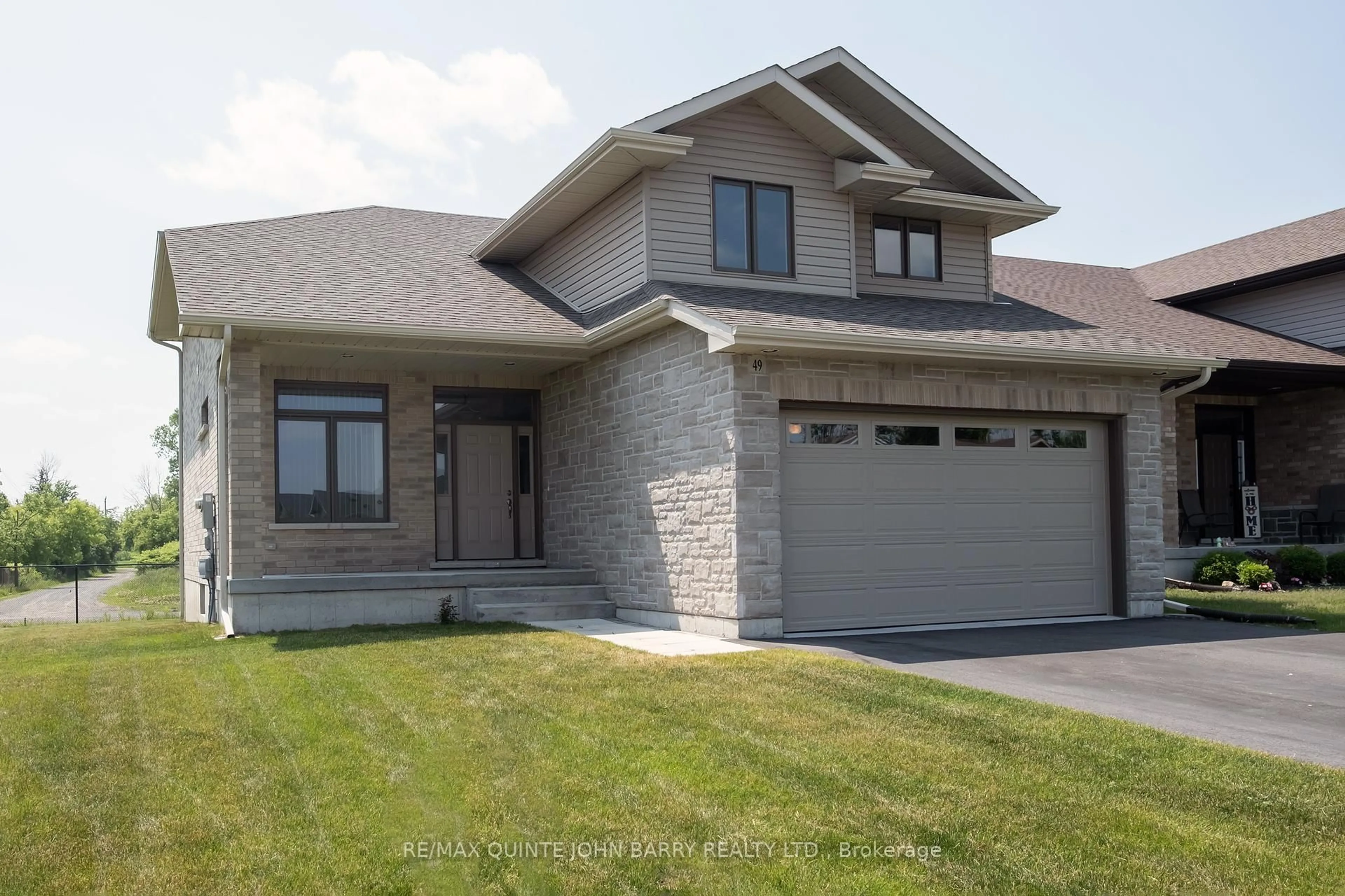 Home with brick exterior material, street for 49 Lanark Dr, Belleville Ontario K8N 0G8