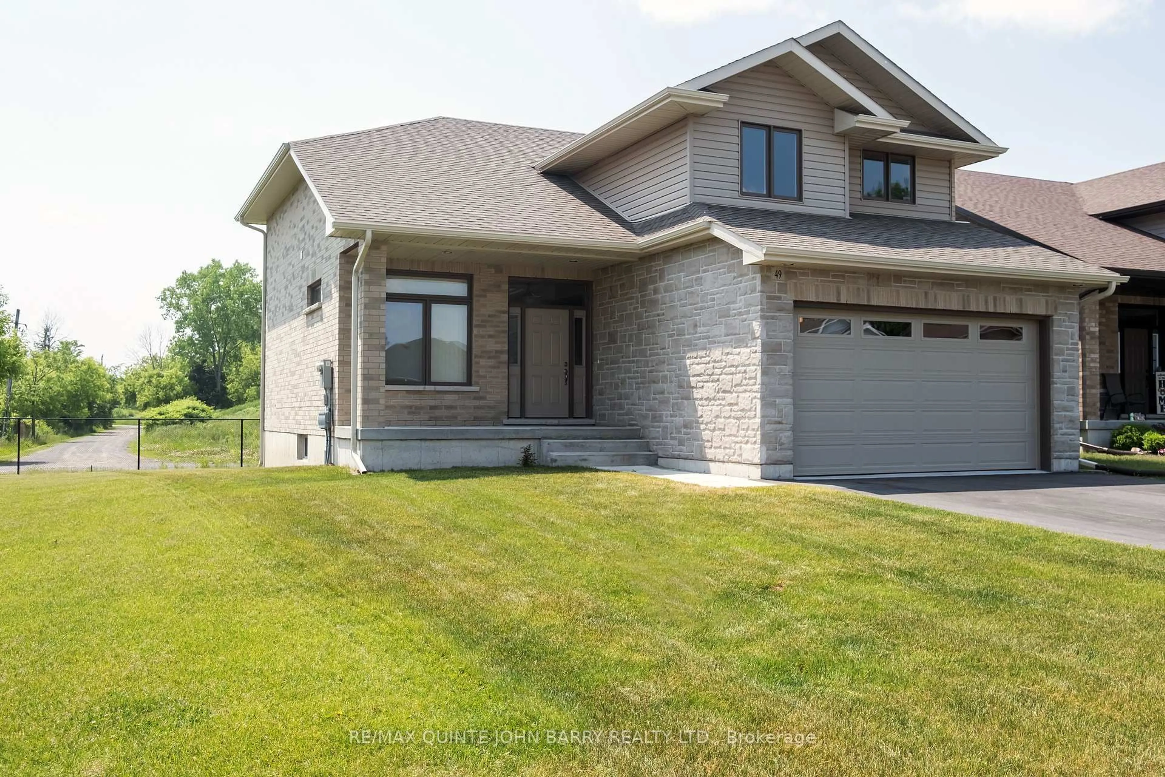 Home with brick exterior material, street for 49 Lanark Dr, Belleville Ontario K8N 0G8