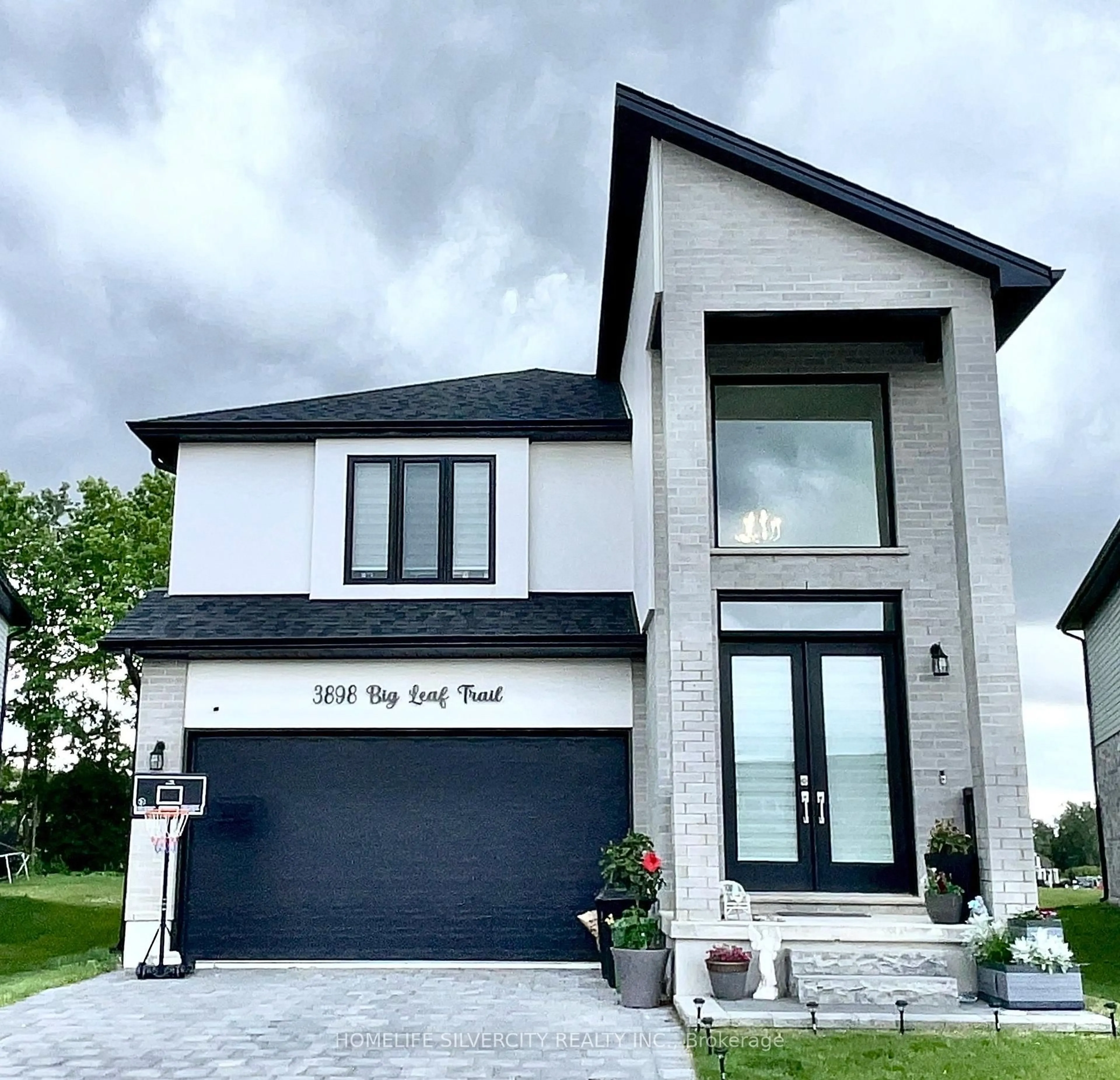 Home with brick exterior material, street for 3898 Big Leaf Tr, London South Ontario N0P 0K1