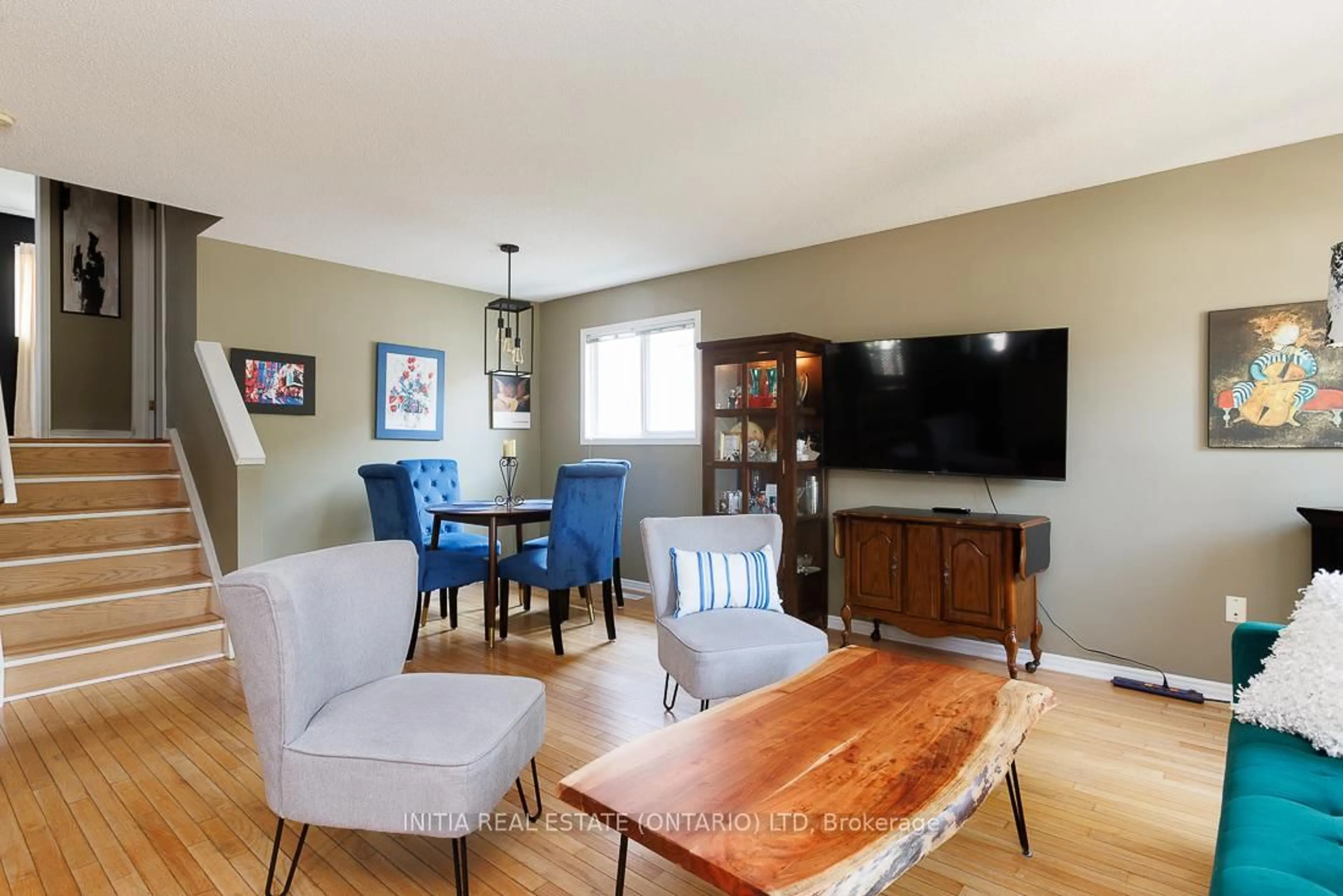 Living room with furniture, wood/laminate floor for 59 Pennybrook Cres #36, London North Ontario N5X 4C3