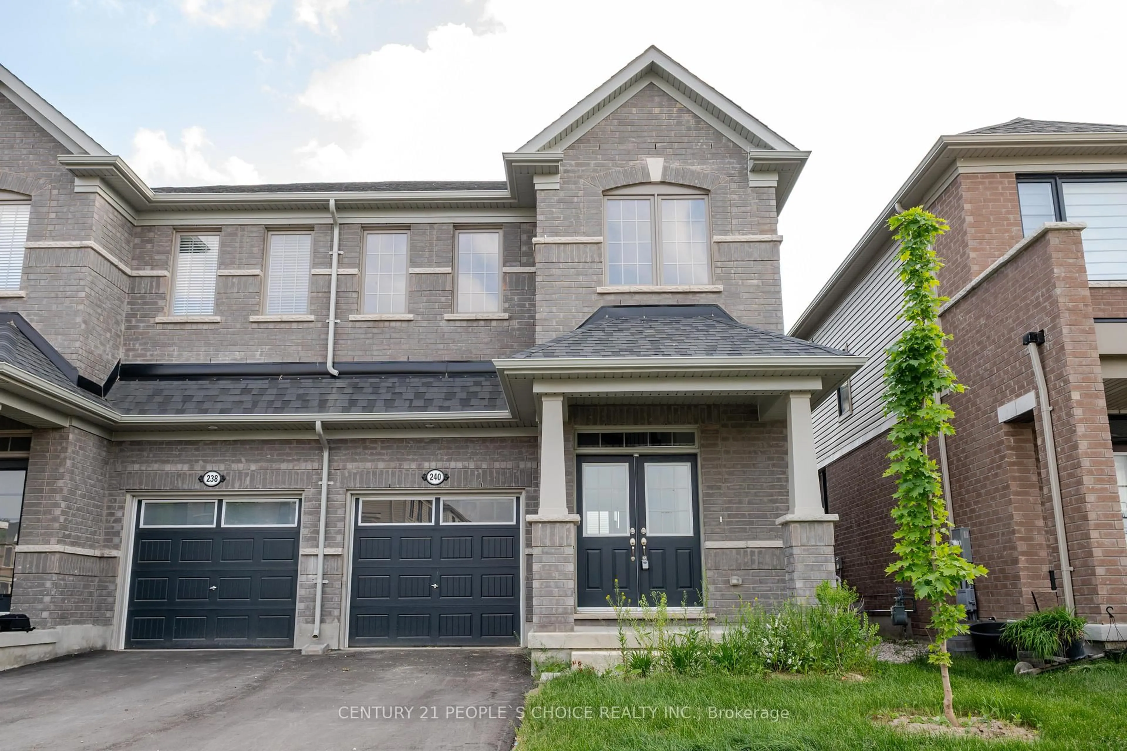 Home with brick exterior material, street for 240 Elliot Ave, Centre Wellington Ontario N1M 0J8