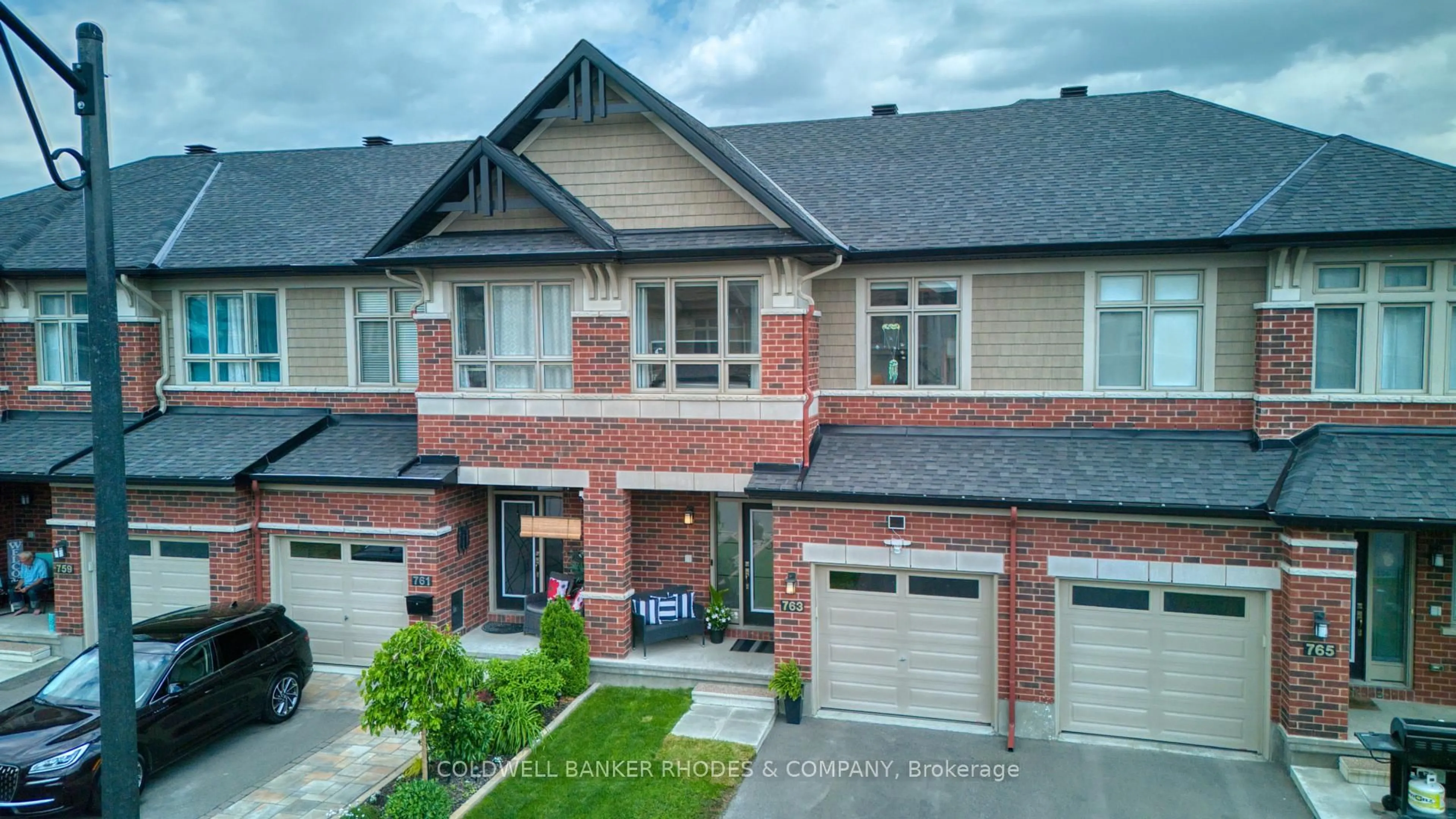 Home with brick exterior material, street for 763 Cairn Cres, Ottawa Ontario K1W 0P4