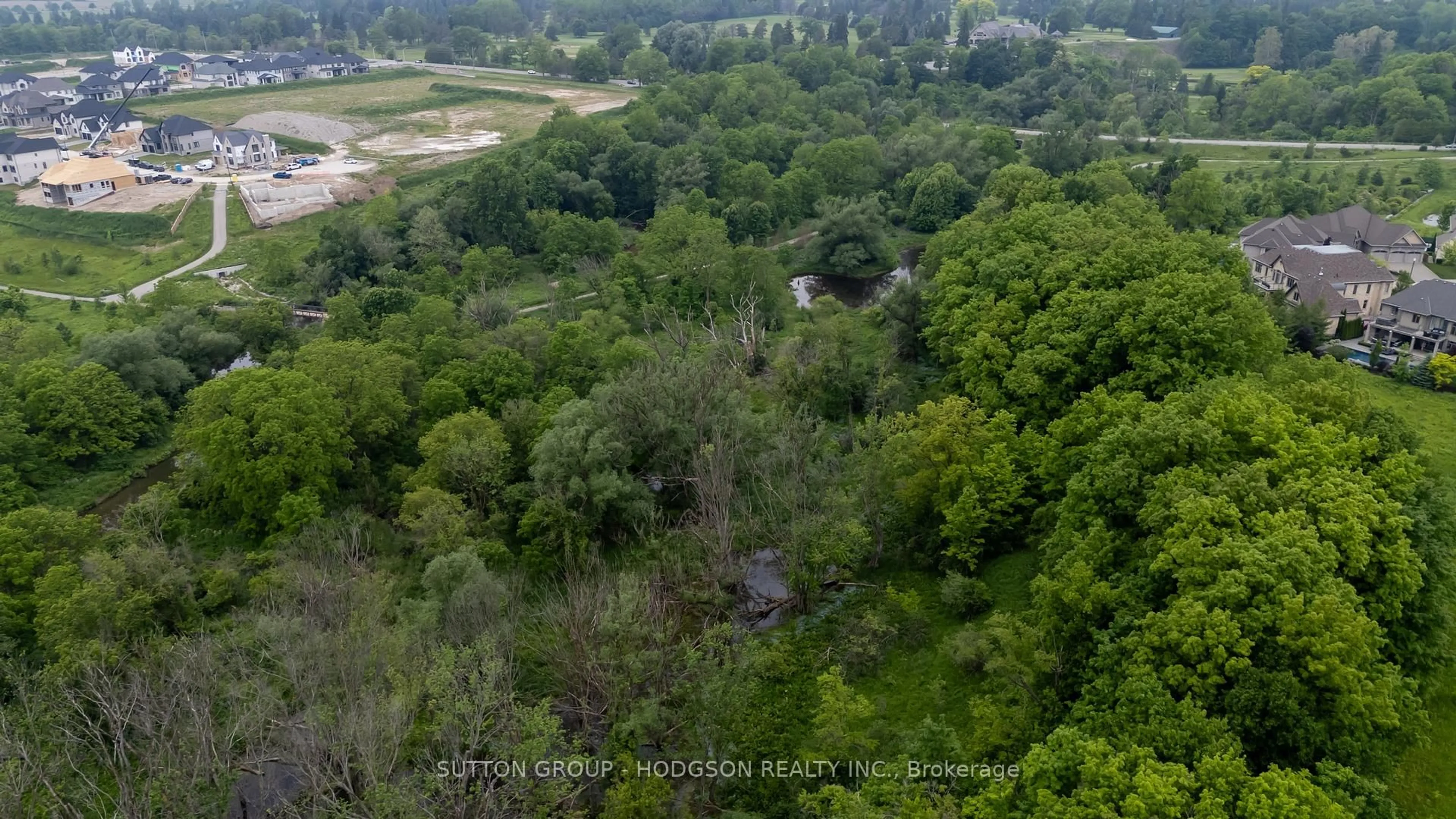 A pic from outside/outdoor area/front of a property/back of a property/a pic from drone, forest/trees view for 2359 Waterside Crt, London North Ontario N6G 0L9