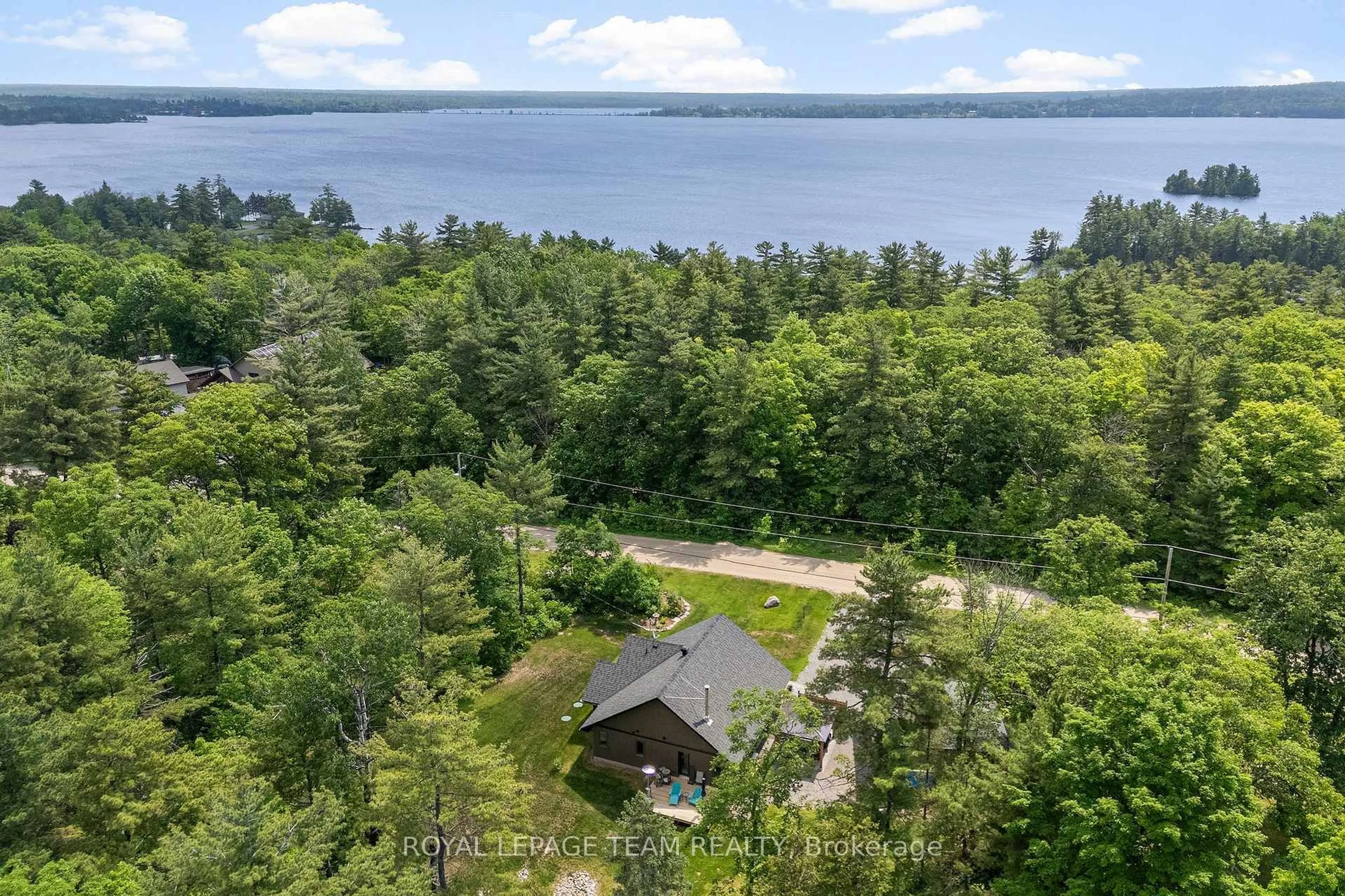A pic from outside/outdoor area/front of a property/back of a property/a pic from drone, water/lake/river/ocean view for 554 Poplar Way, Calabogie Ontario K0J 1H0