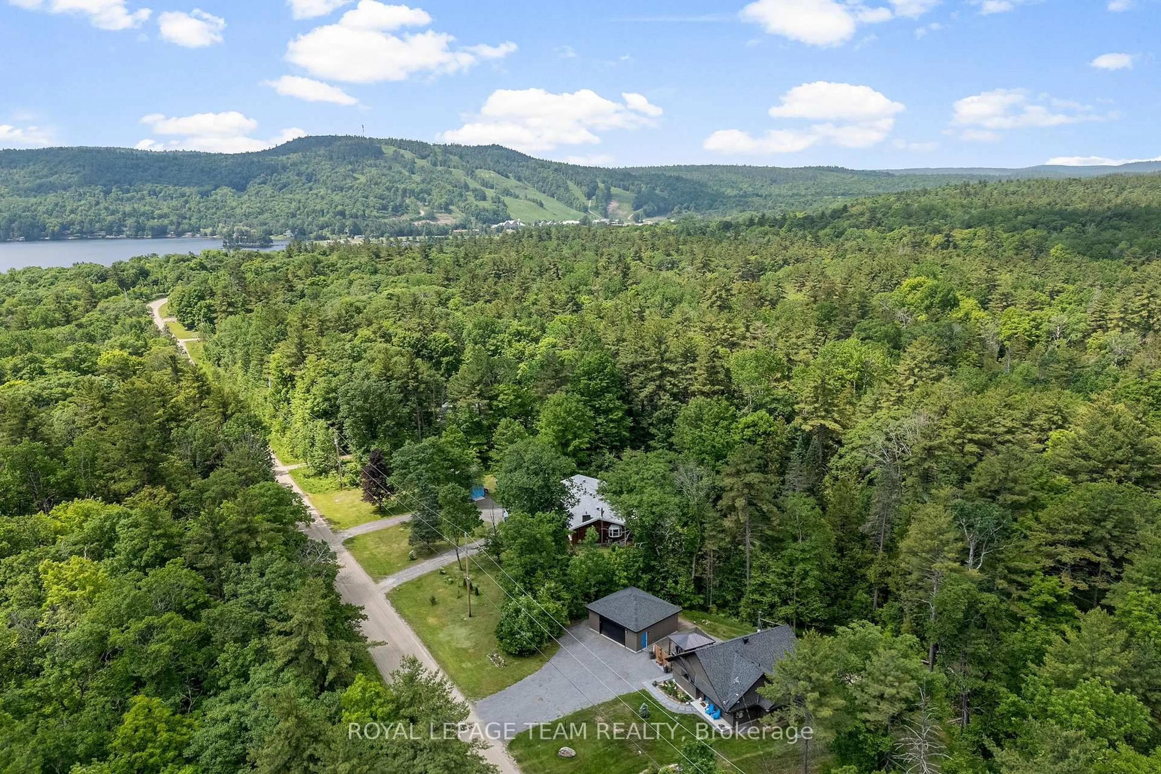 A pic from outside/outdoor area/front of a property/back of a property/a pic from drone, forest/trees view for 554 Poplar Way, Calabogie Ontario K0J 1H0