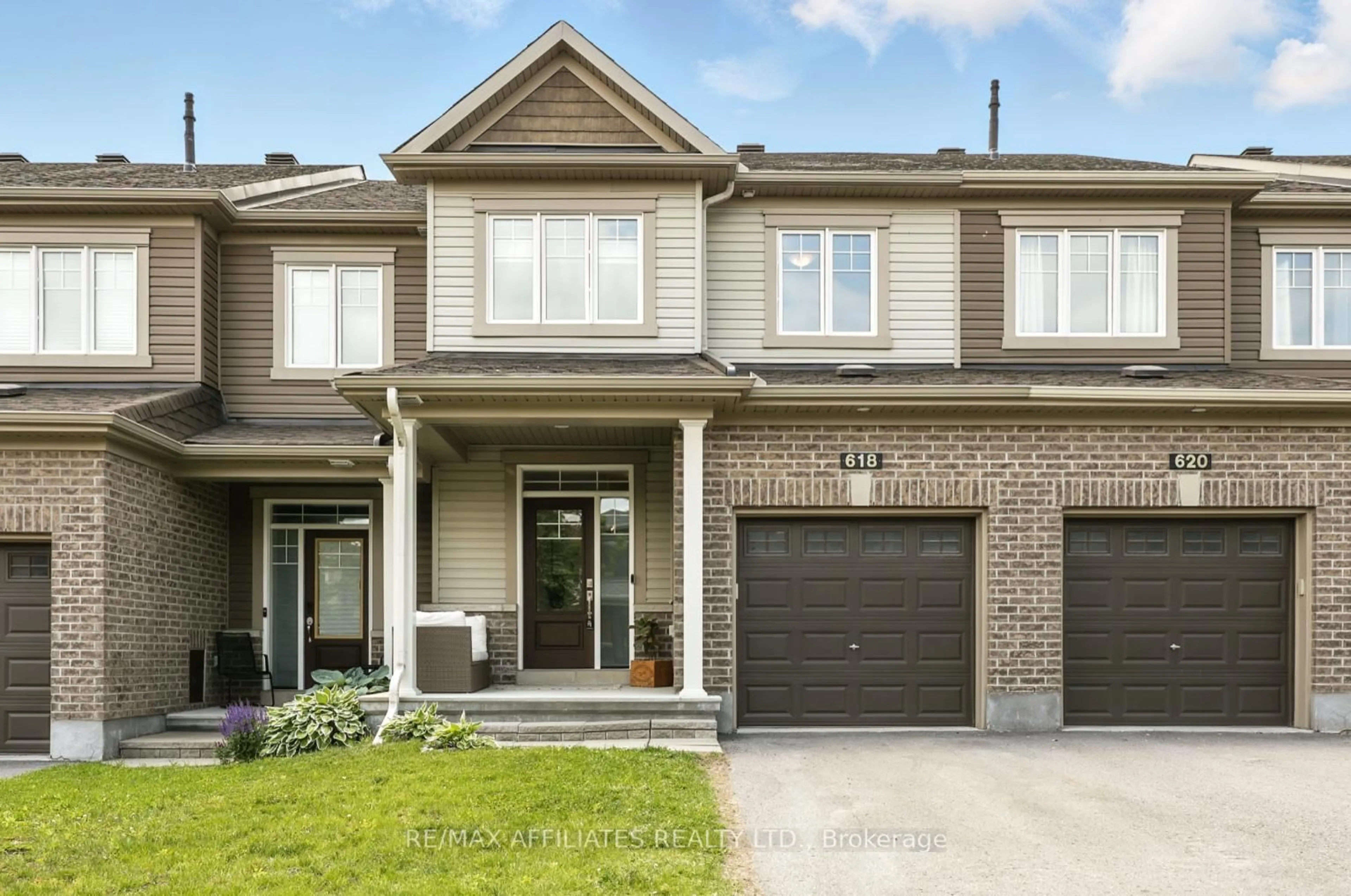 Home with brick exterior material, street for 618 Geranium Walk, Stittsville Ontario K2S 2J3