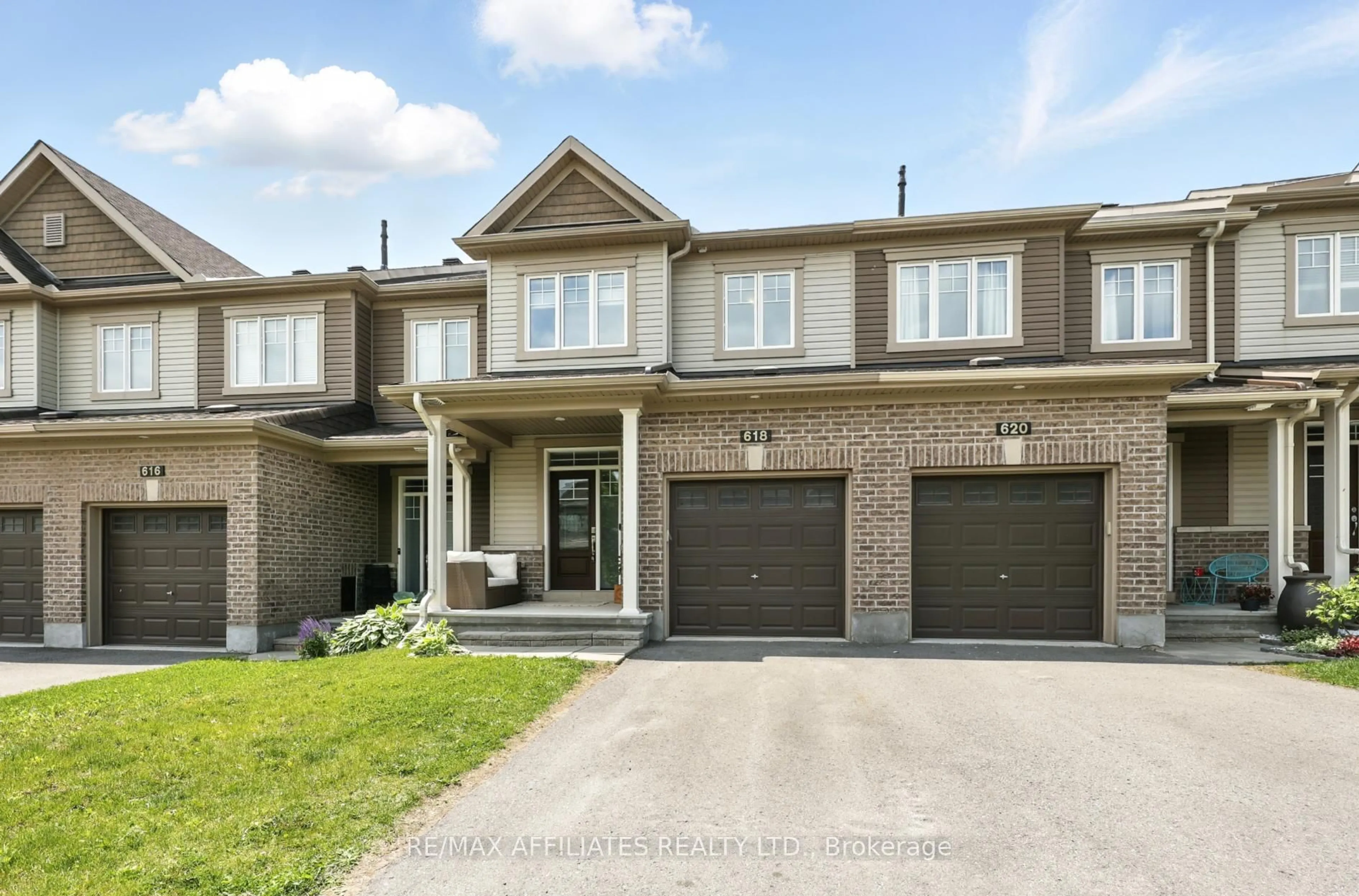Home with brick exterior material, street for 618 Geranium Walk, Stittsville Ontario K2S 2J3