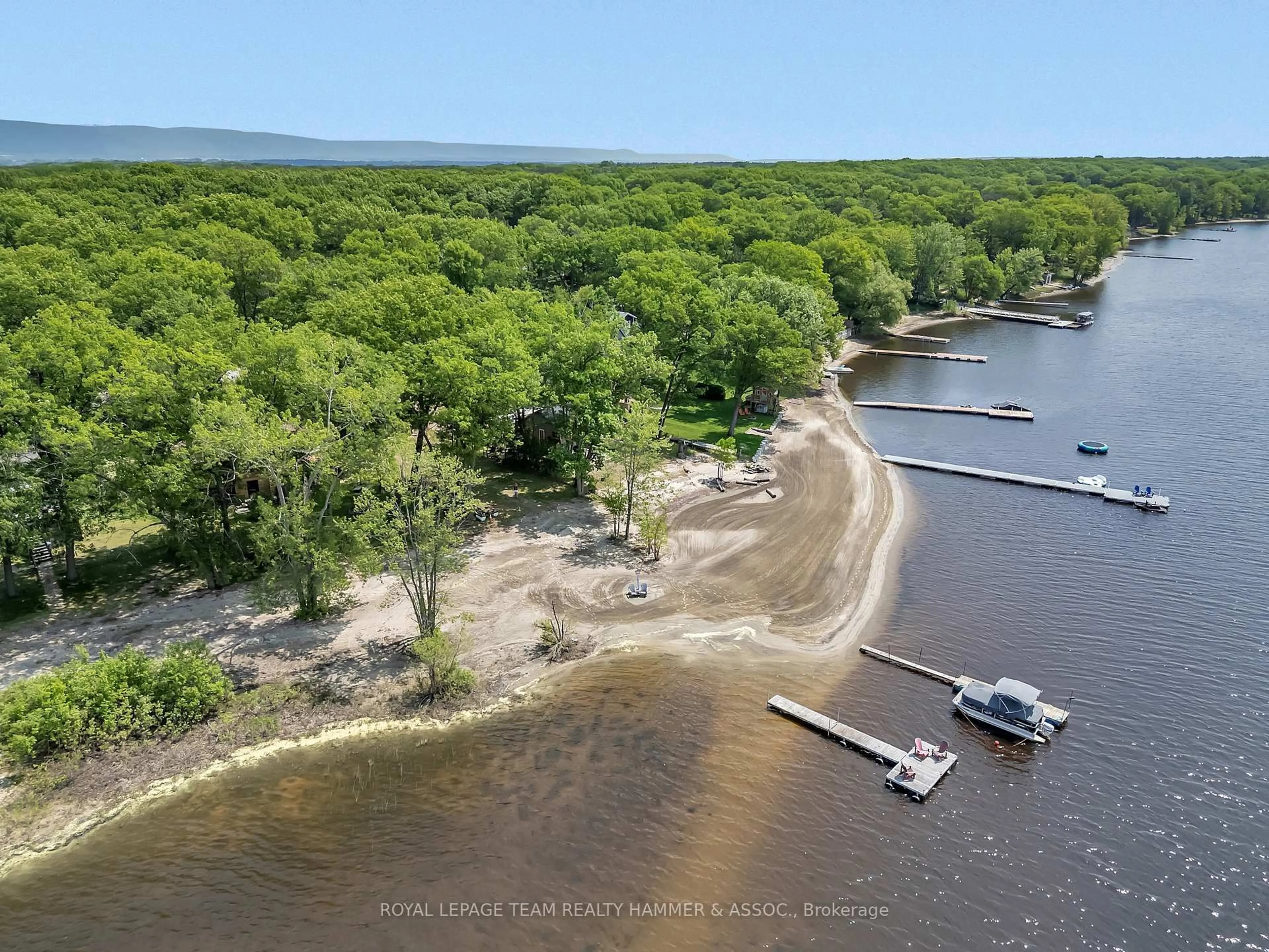 A pic from outside/outdoor area/front of a property/back of a property/a pic from drone, water/lake/river/ocean view for 1034 Bayview Dr, Ottawa Ontario K0A 3M0