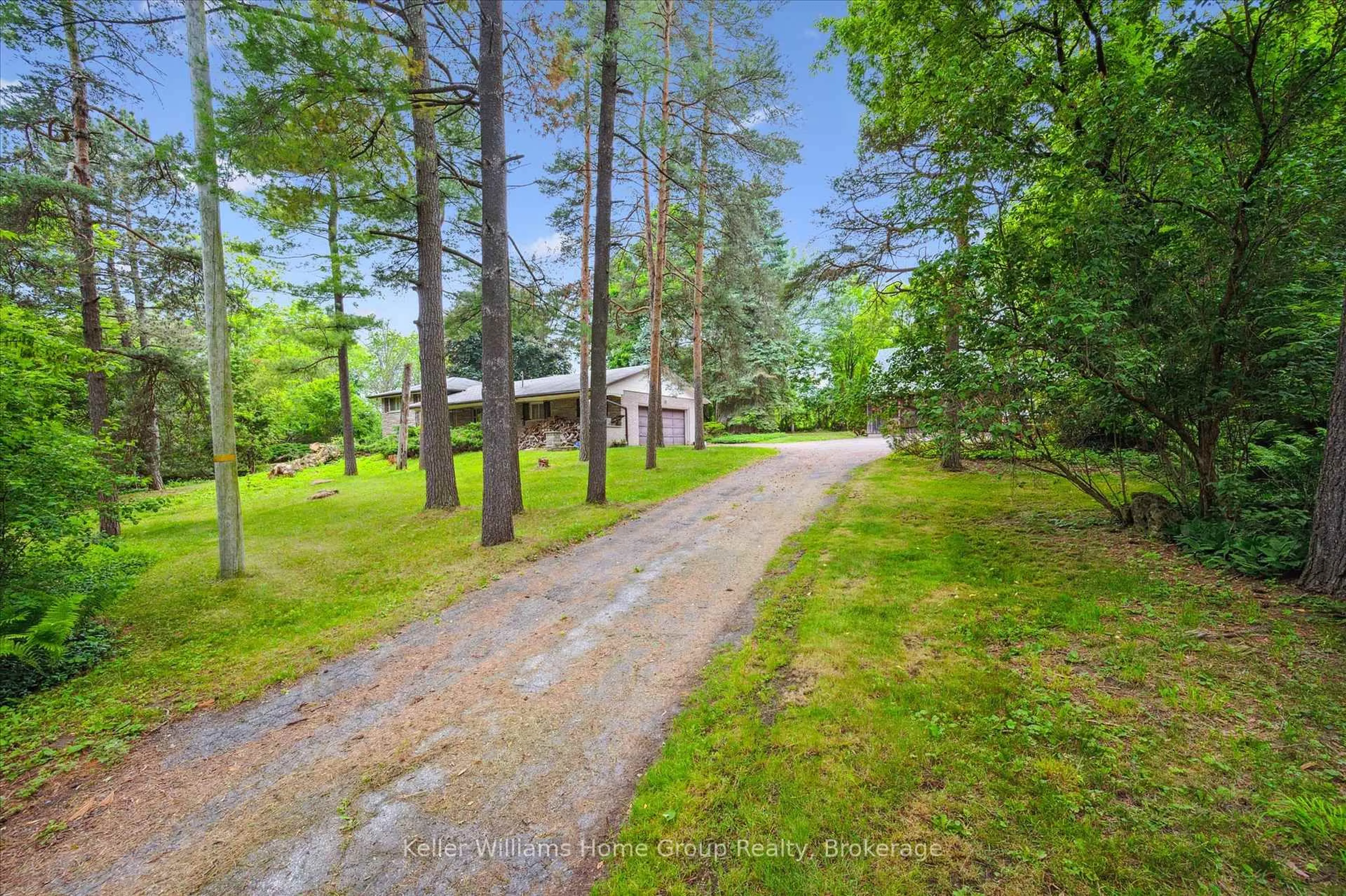 A pic from outside/outdoor area/front of a property/back of a property/a pic from drone, forest/trees view for 7850 7 Highway, Guelph/Eramosa Ontario N1H 6H8