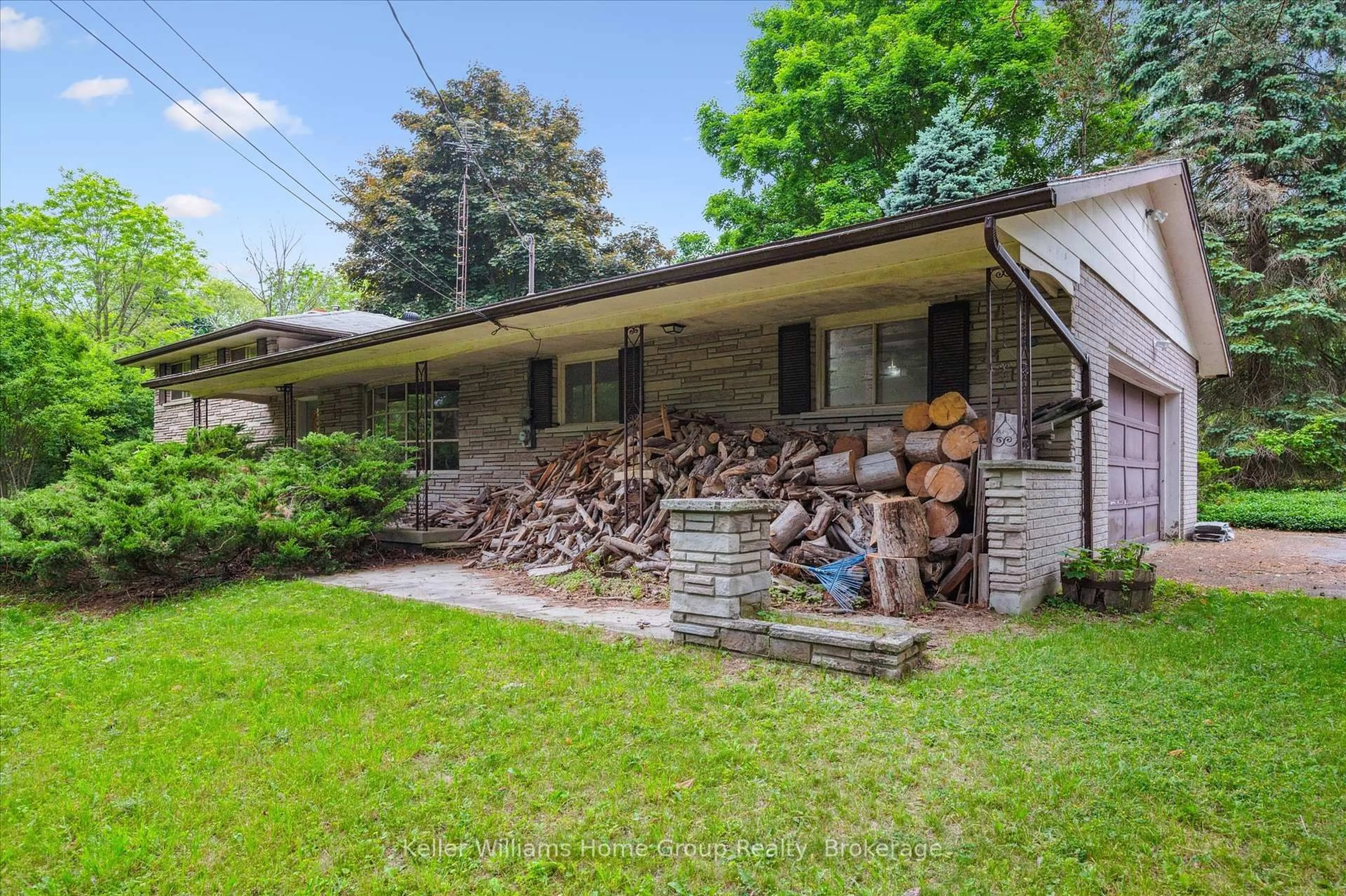 Home with brick exterior material, street for 7850 7 Highway, Guelph/Eramosa Ontario N1H 6H8